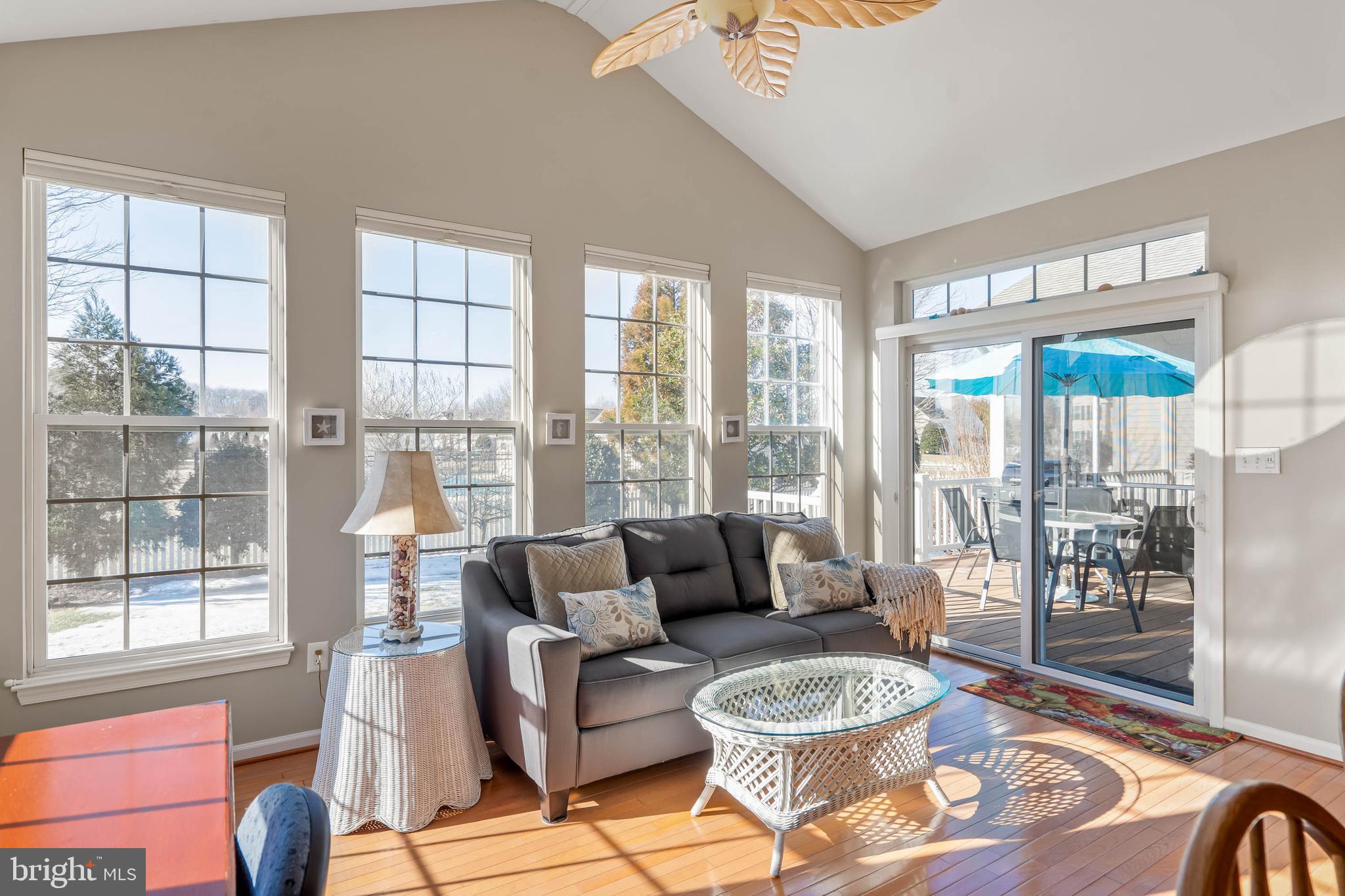 37140 Lord Baltimore Lane Ocean View, DE 19970 - Photo 19 of 56 a living room with furniture and a large window
