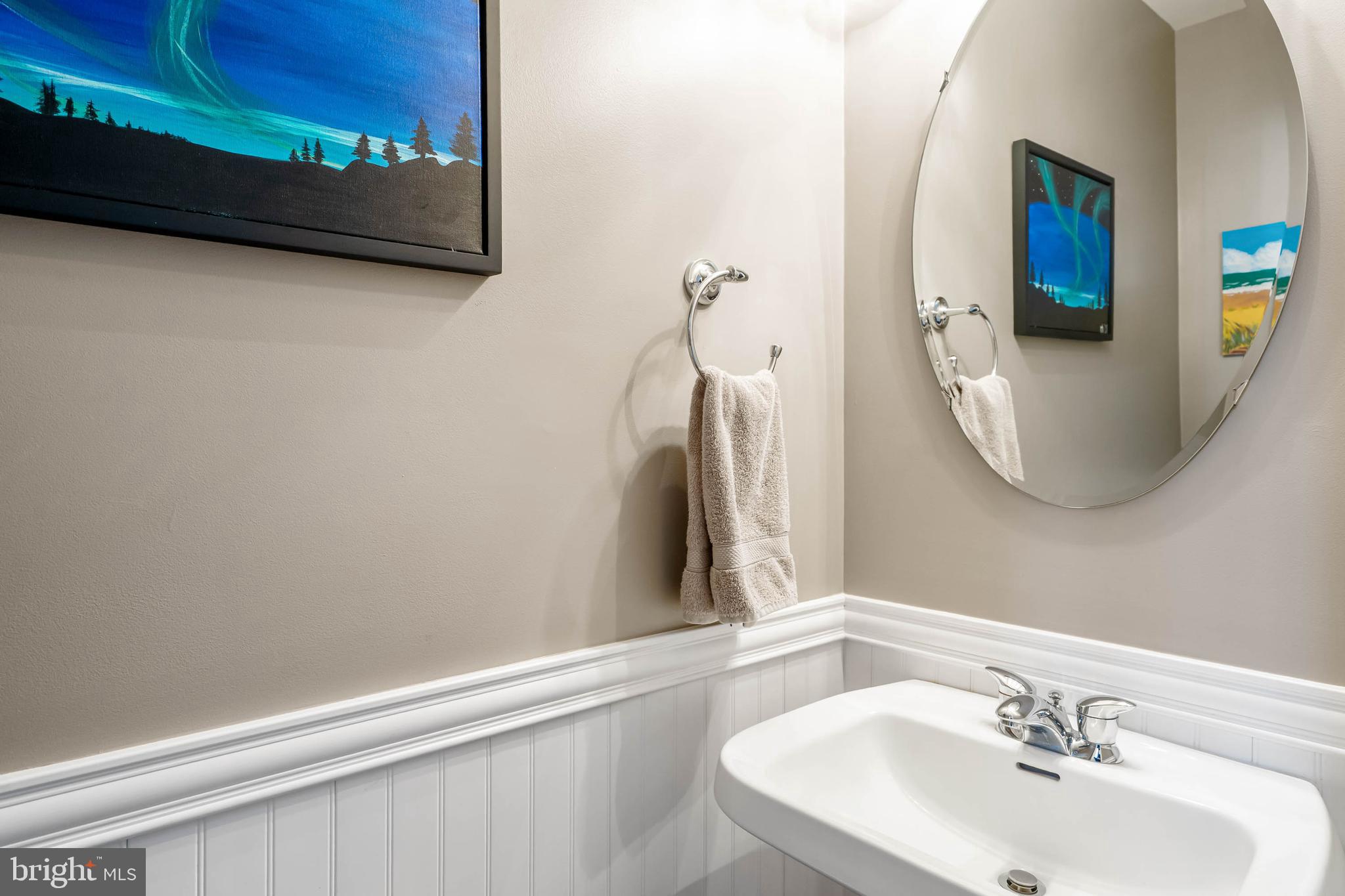 37140 Lord Baltimore Lane Ocean View, DE 19970 - Photo 28 of 56 a bathroom with a sink and a mirror