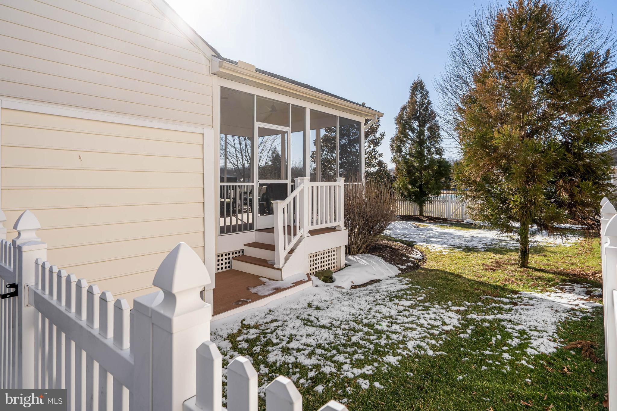 37140 Lord Baltimore Lane Ocean View, DE 19970 - Photo 40 of 56 a view of a house with a yard and sitting area