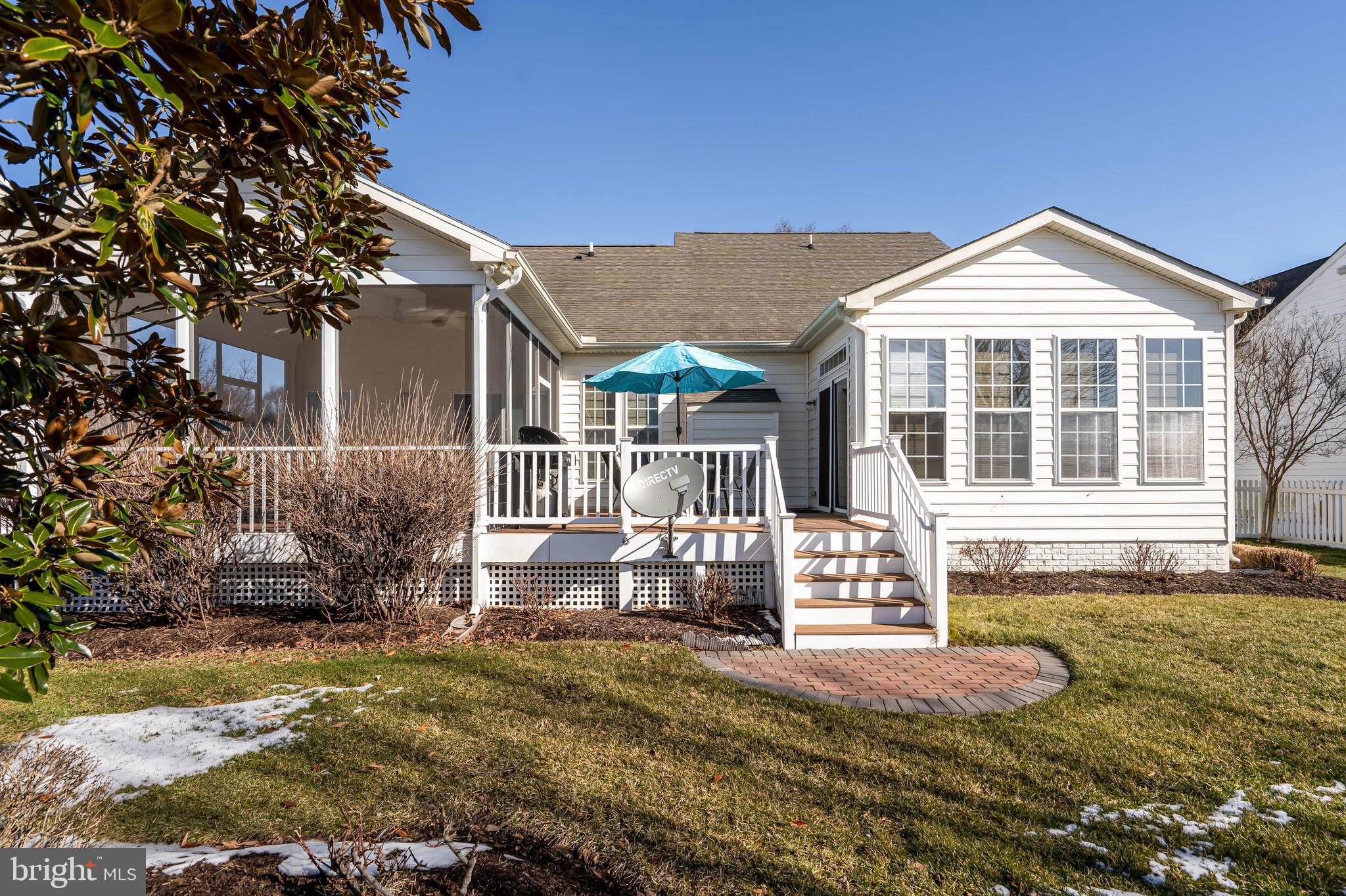 37140 Lord Baltimore Lane Ocean View, DE 19970 - Photo 43 of 56 a front view of a house with a yard