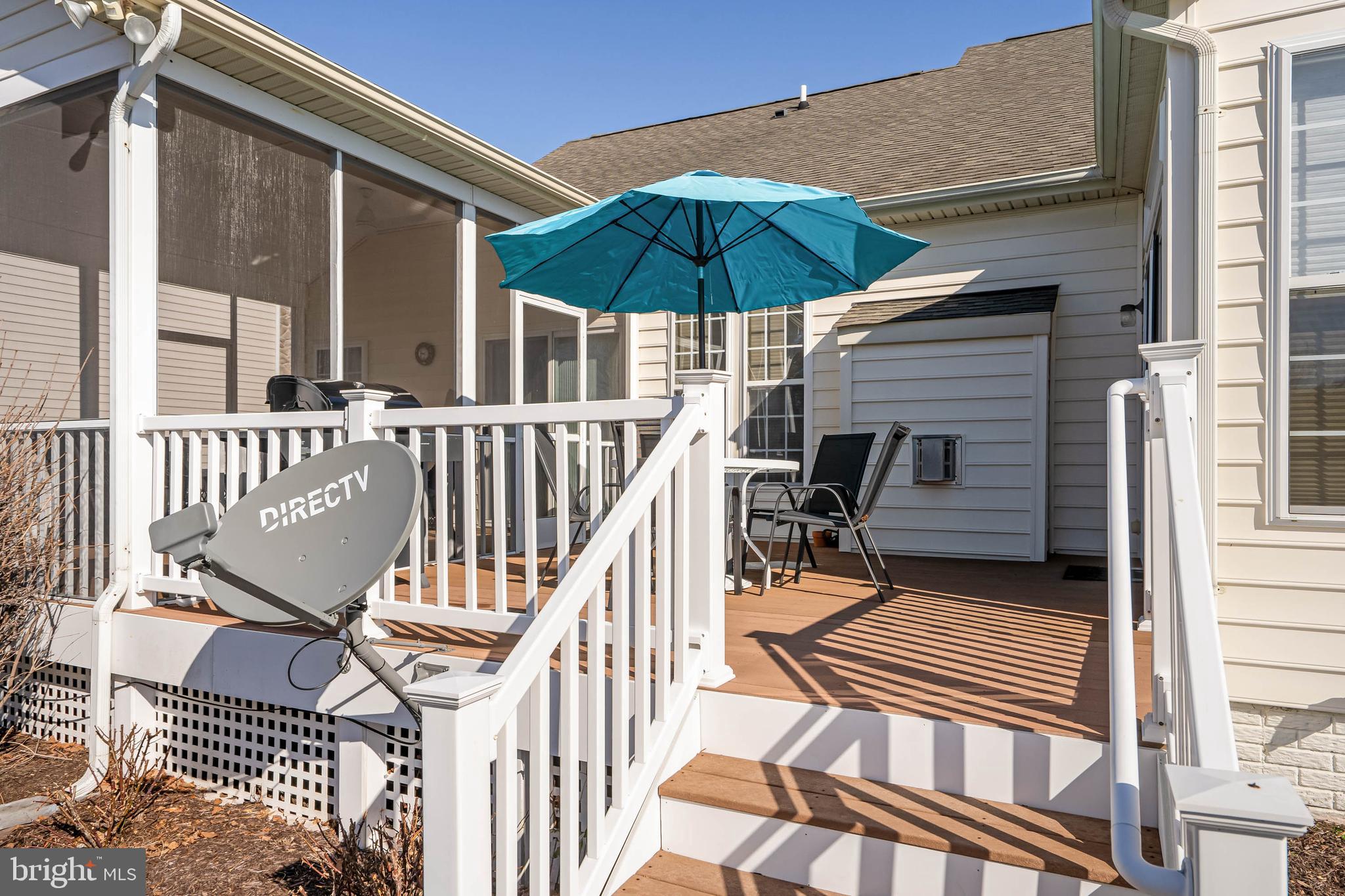 37140 Lord Baltimore Lane Ocean View, DE 19970 - Photo 45 of 56 a view of a patio with a table and chairs