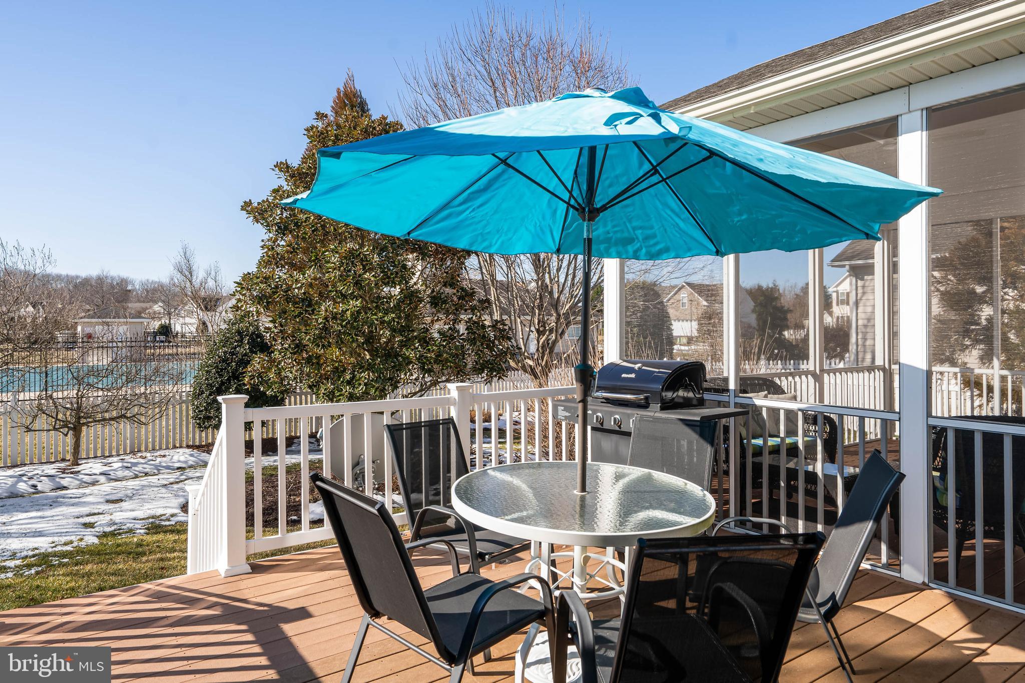 37140 Lord Baltimore Lane Ocean View, DE 19970 - Photo 46 of 56 a view of balcony with outdoor seating and wooden floor