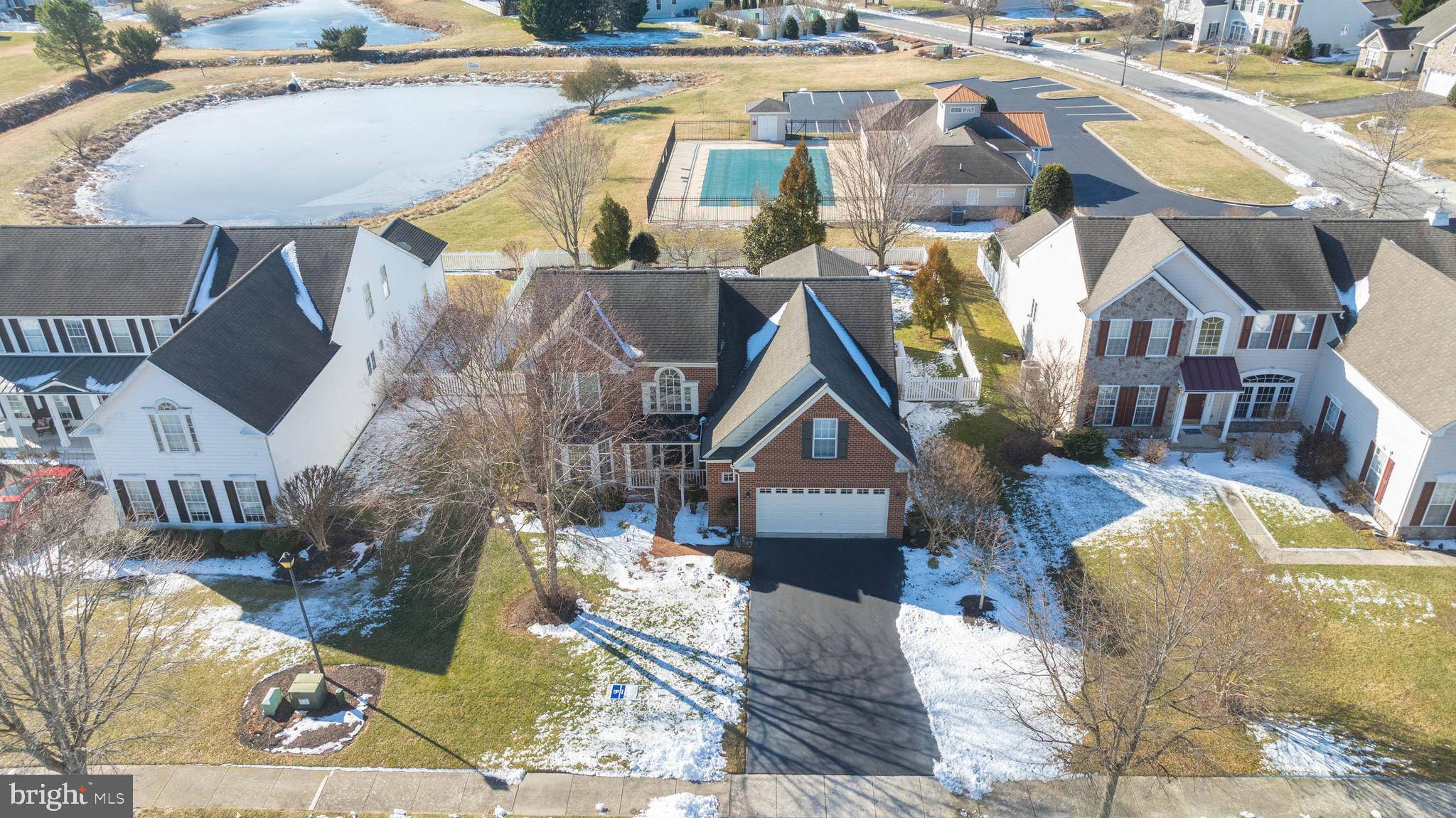 37140 Lord Baltimore Lane Ocean View, DE 19970 - Photo 5 of 56 a front view of a house with a yard