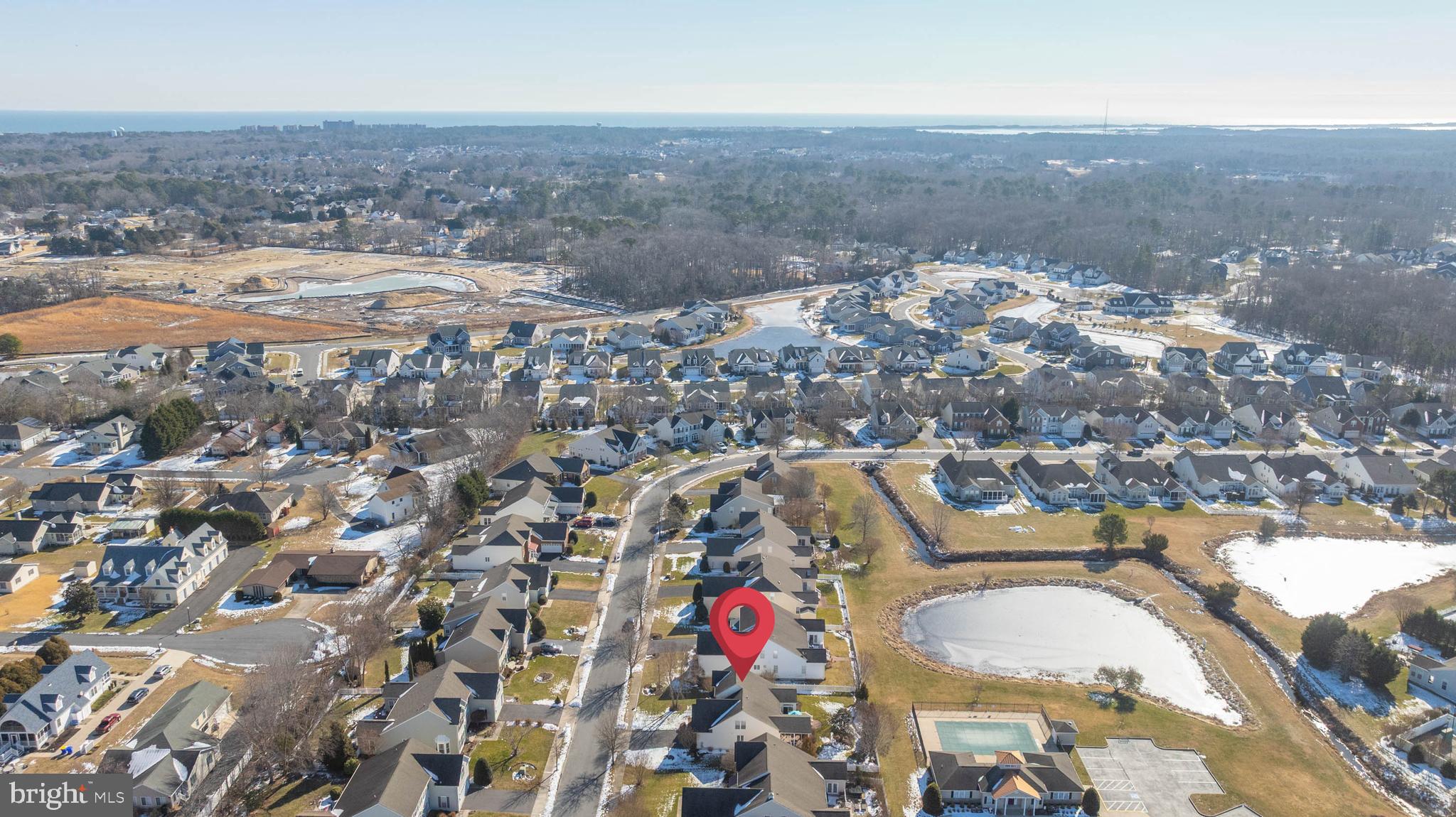 37140 Lord Baltimore Lane Ocean View, DE 19970 - Photo 52 of 56 an aerial view of residential houses with outdoor space