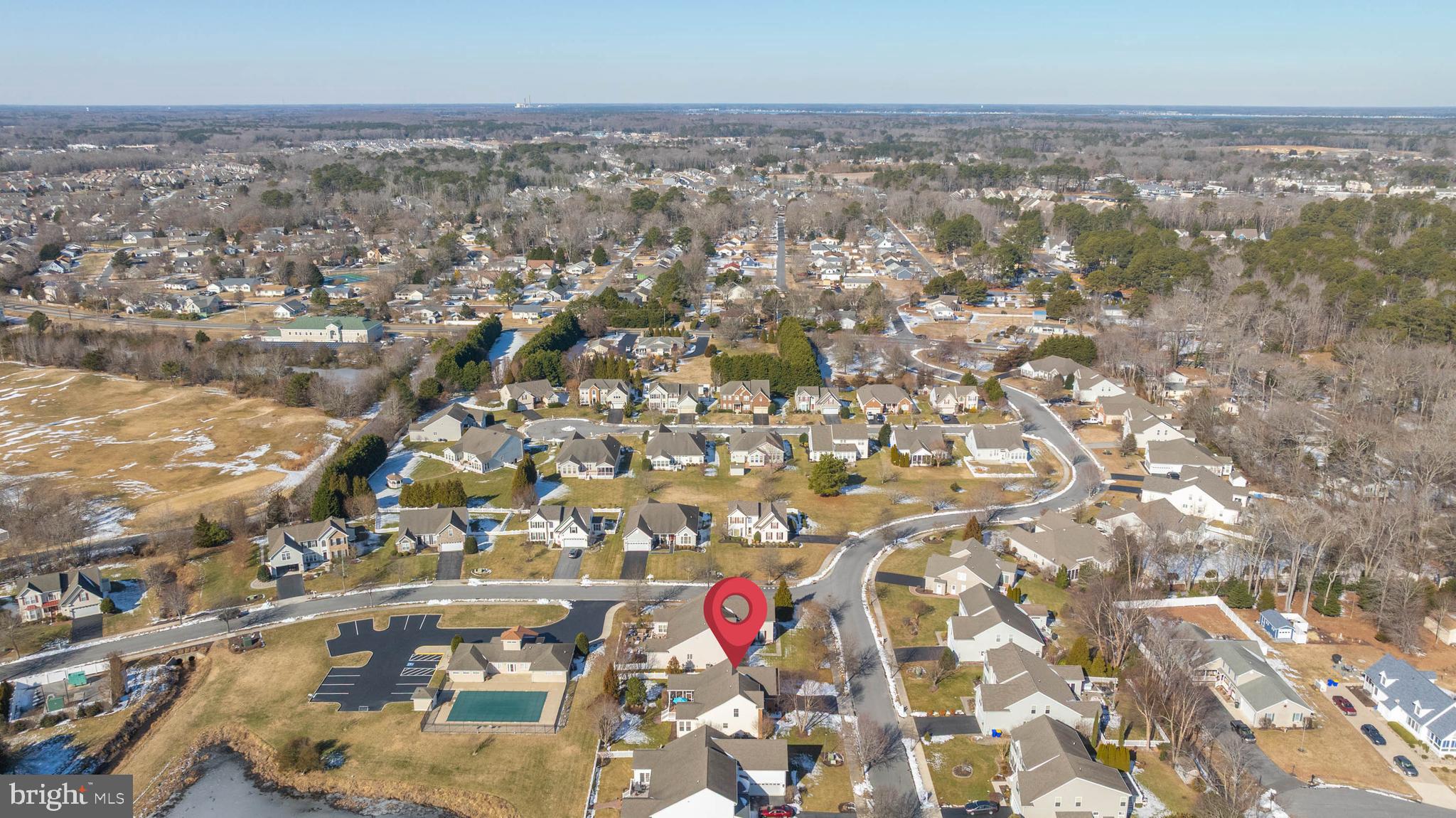 37140 Lord Baltimore Lane Ocean View, DE 19970 - Photo 53 of 56 an aerial view of residential building and parking space