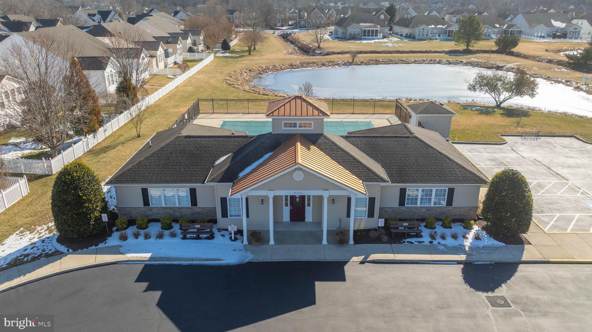 37140 Lord Baltimore Lane Ocean View, DE 19970 - Photo 54 of 56 a front view of a house with a yard