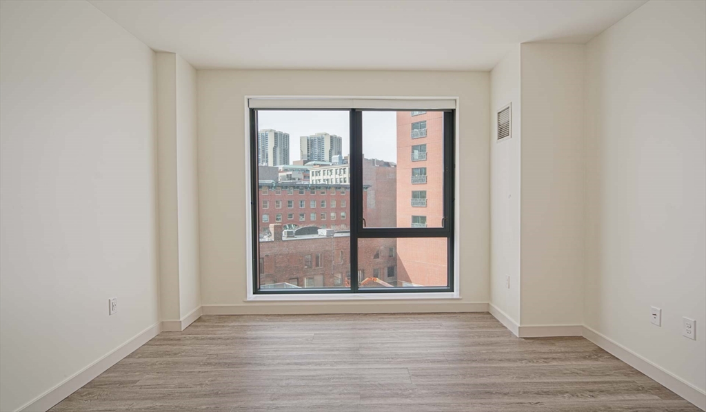 1 Canal Street, Unit 915 Boston, MA 02114 - Photo 3 of 11 a view of a room that has a window in it
