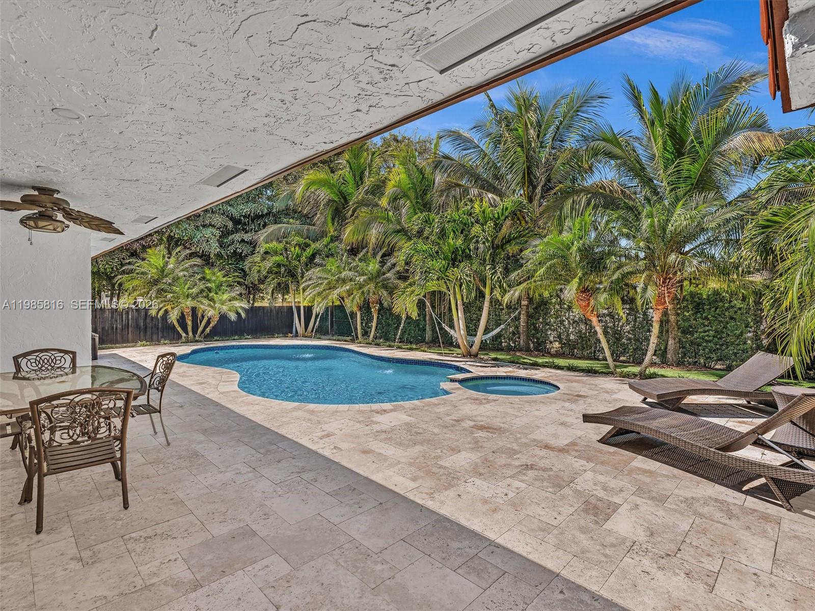 4501 Southwest 133rd Avenue Southwest Ranches, FL 33330 - Photo 71 of 100 a view of swimming pool with lawn chairs and couches