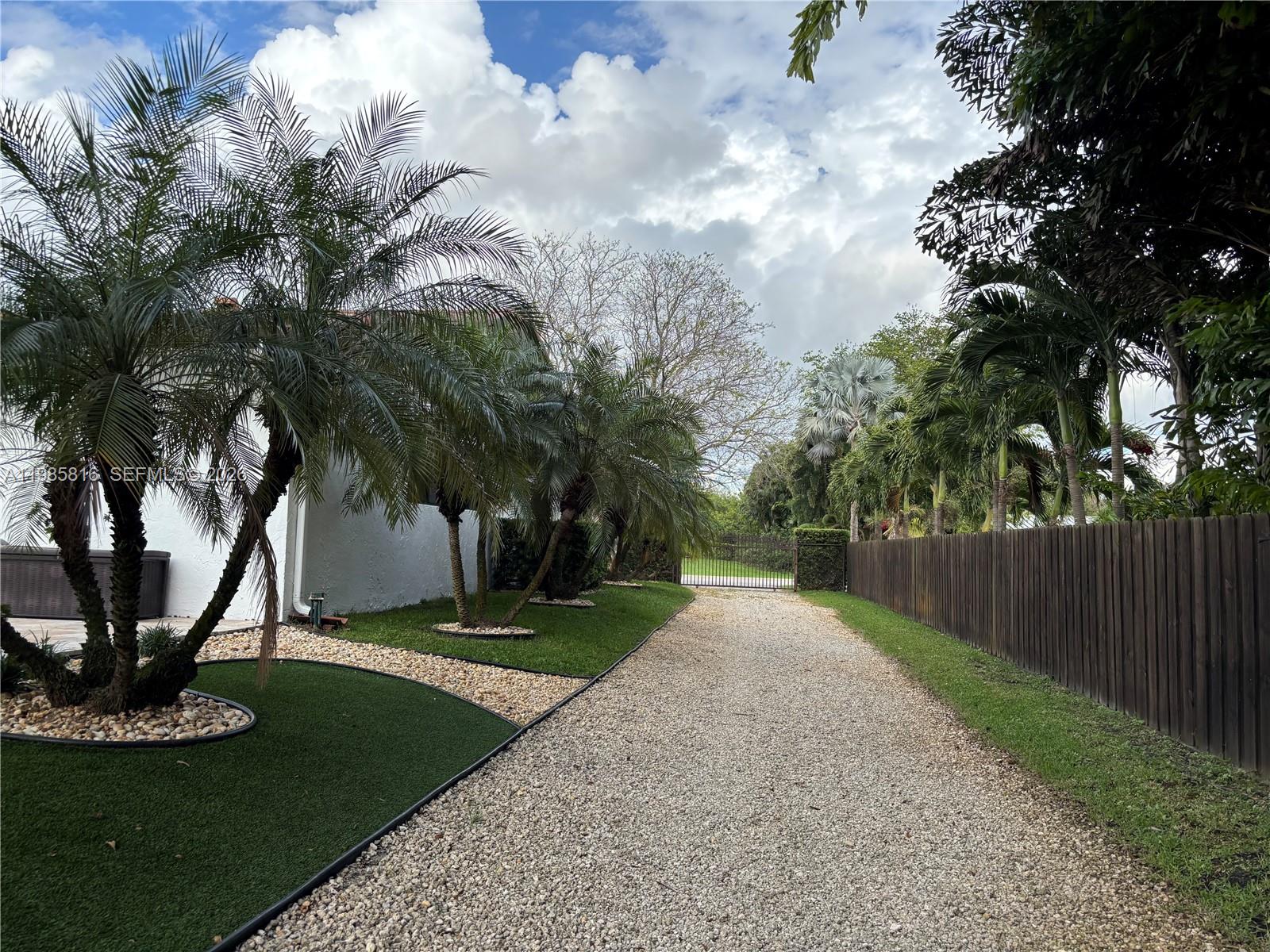 4501 Southwest 133rd Avenue Southwest Ranches, FL 33330 - Photo 99 of 100 a view of a backyard with large tree