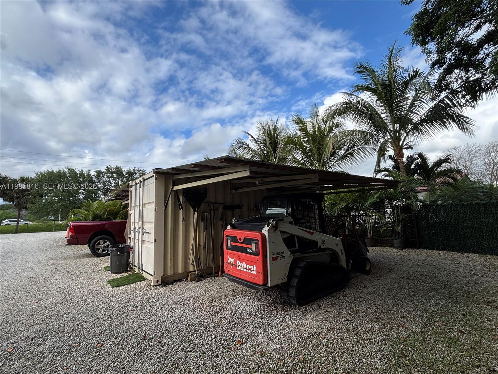 4501 Southwest 133rd Avenue Southwest Ranches, FL 33330 - Photo 100 of 100 a view of outdoor space fire pit and outdoor seating