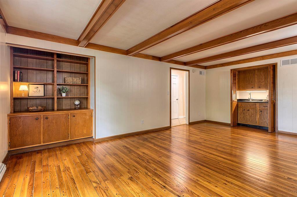 3222 Ridgeway Road Greensburg, PA 15601 - Photo 14 of 46 a view of an empty room with wooden floor and a window