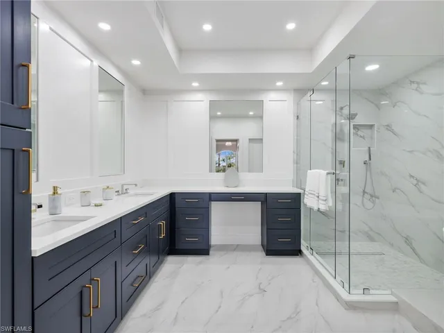 a spacious bedroom with a bed and a window