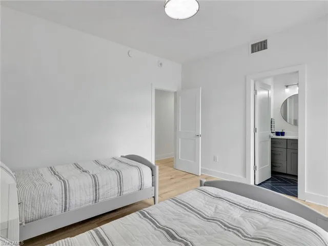 a dining room with furniture window wooden floor and a table