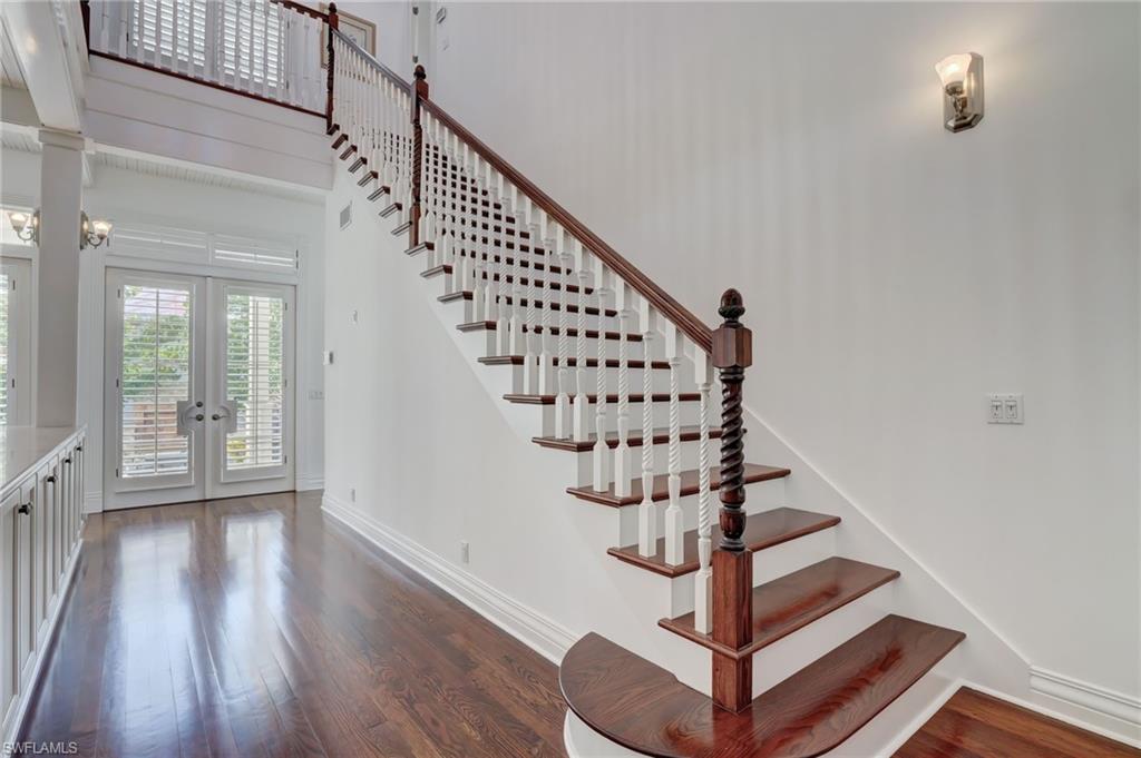 1551 Gulf Shore Boulevard South Naples, FL 34102 - Photo 5 of 44 a view of entryway with wooden floor