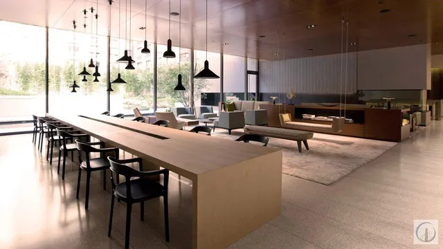 a kitchen with stainless steel appliances kitchen island granite countertop a table chairs stove and a window