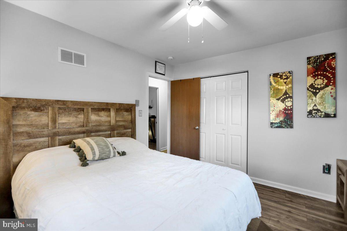 44 Moore Road Mohnton, PA 19540 - Photo 34 of 51 a bedroom with a bed and painting on the wall