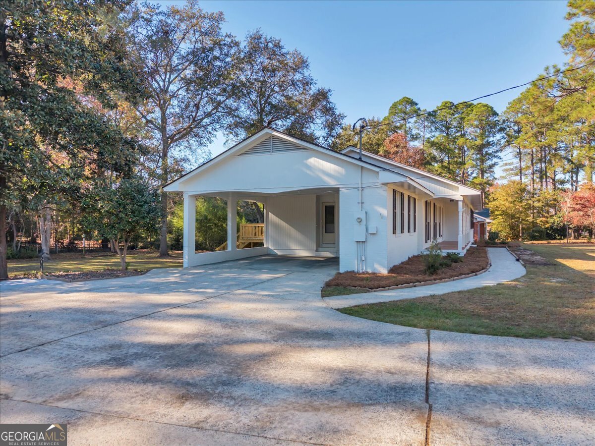 1806 Knox Street Dublin, GA 31021 - Photo 37 of 49 a view of a house with a yard
