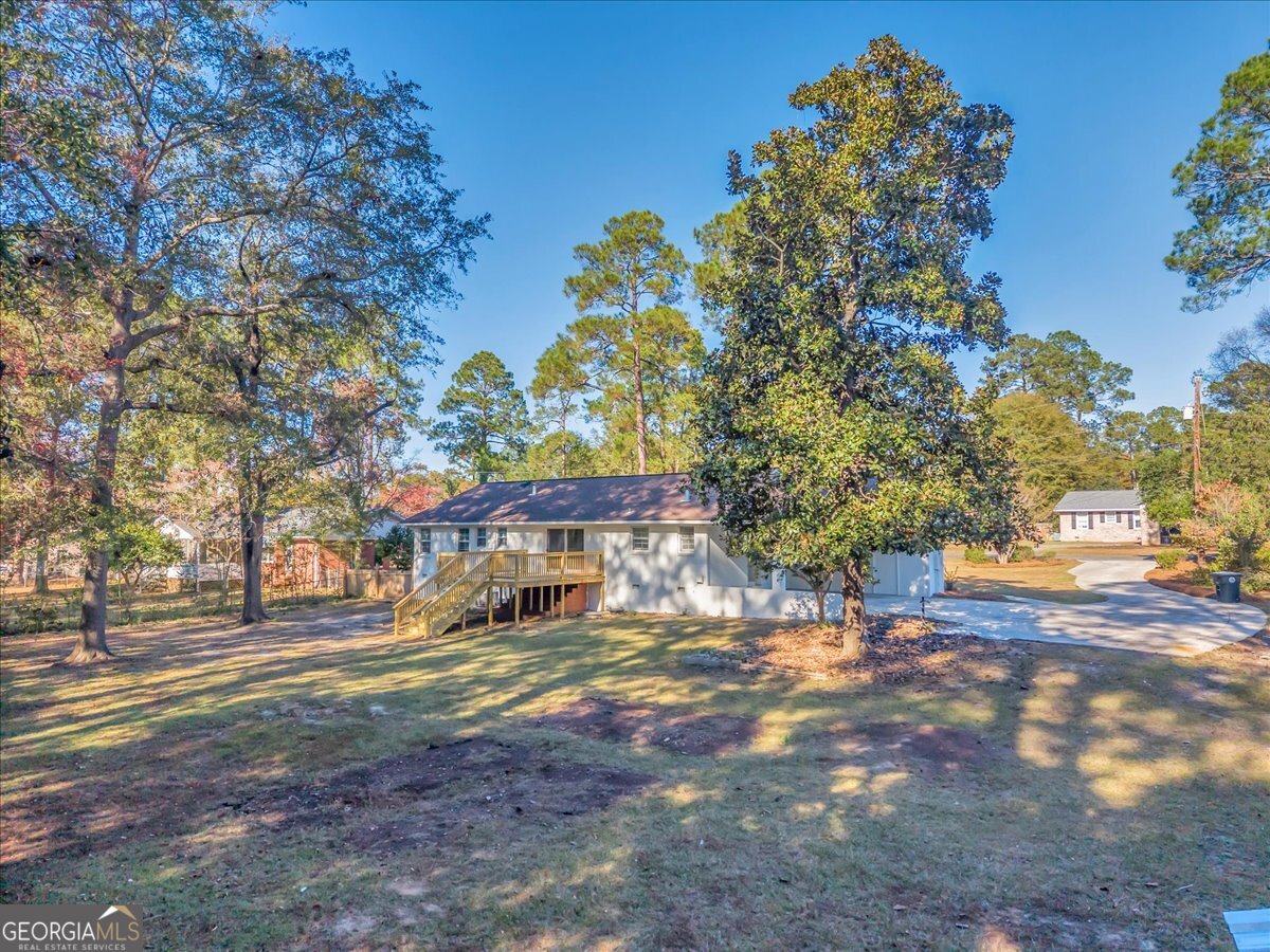 1806 Knox Street Dublin, GA 31021 - Photo 46 of 49 a view of a house with a yard