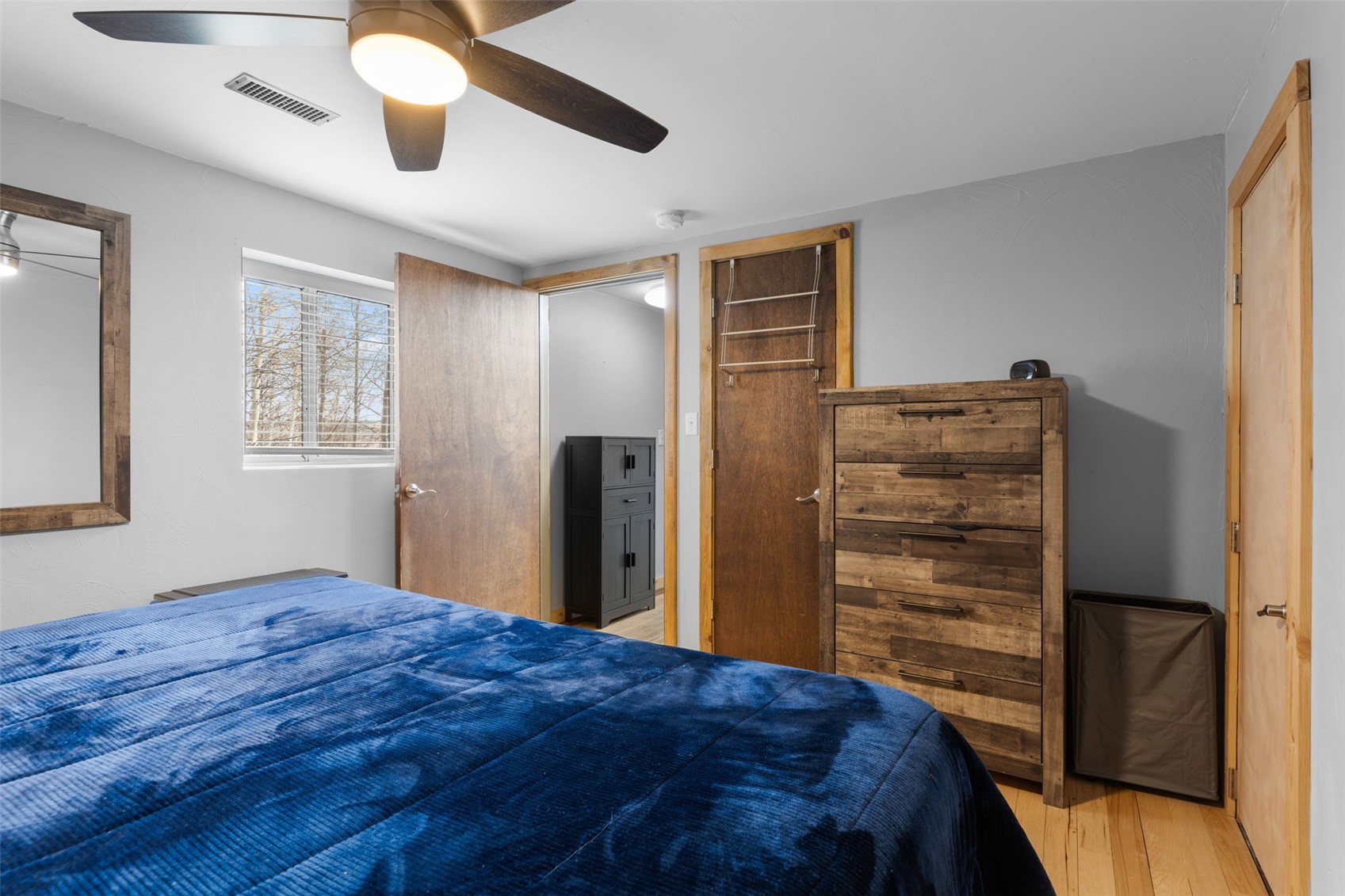 2349 Michigan Hill Road Jefferson, CO 80456 - Photo 29 of 33 a bedroom with a bed and a window