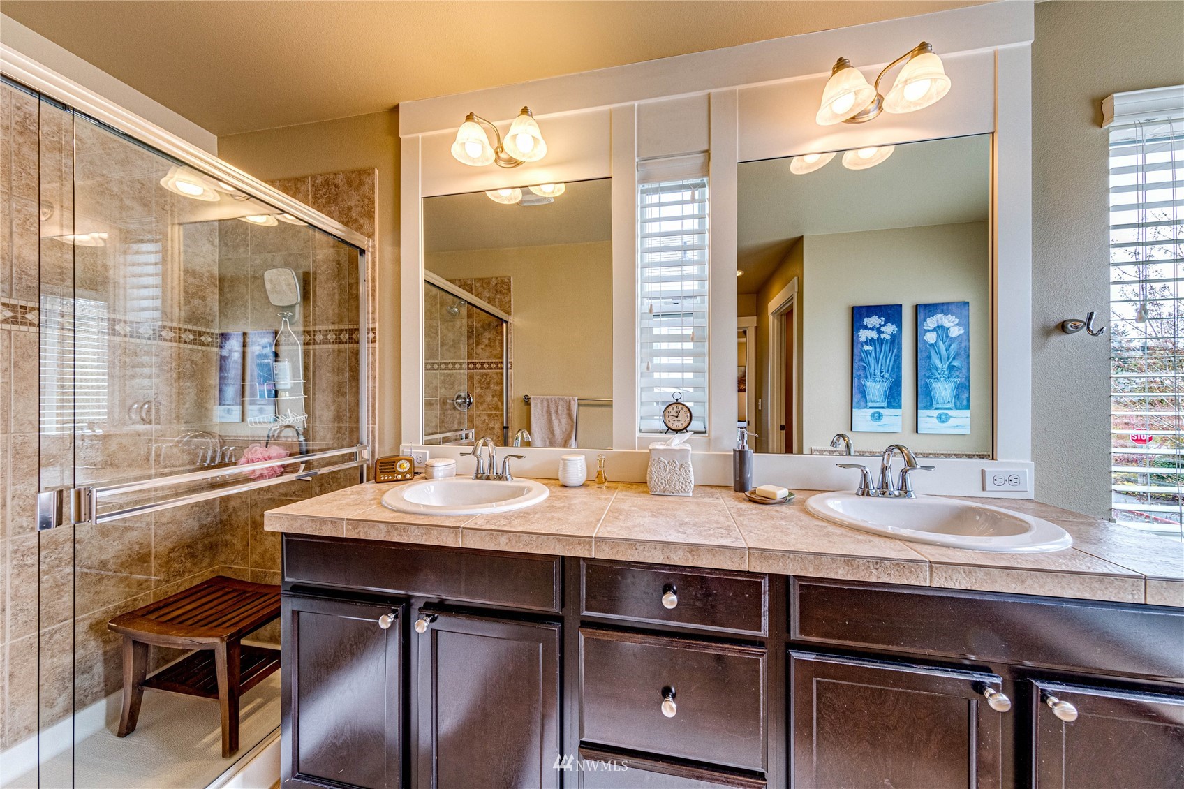 21821 38th Drive Southeast Bothell, WA 98021 - Photo 18 of 29 a bathroom with a sink and a mirror