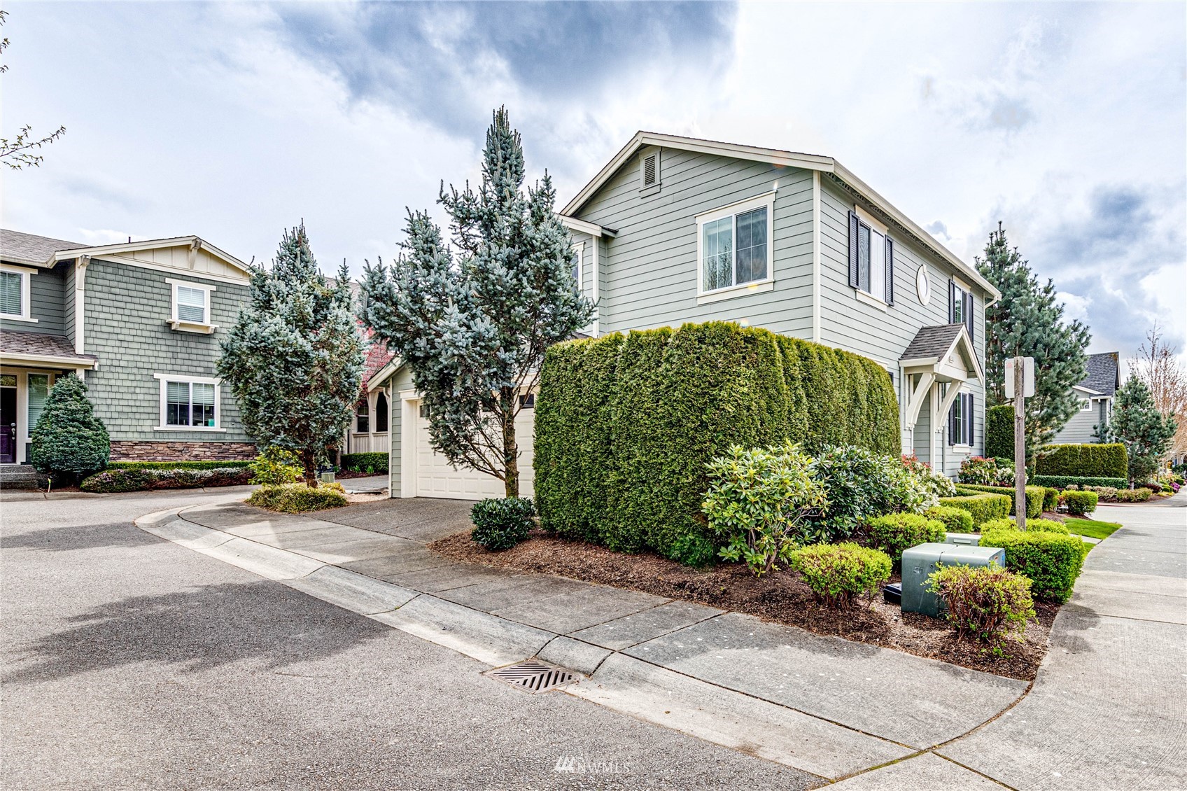 21821 38th Drive Southeast Bothell, WA 98021 - Photo 28 of 29 a front view of a house with garden