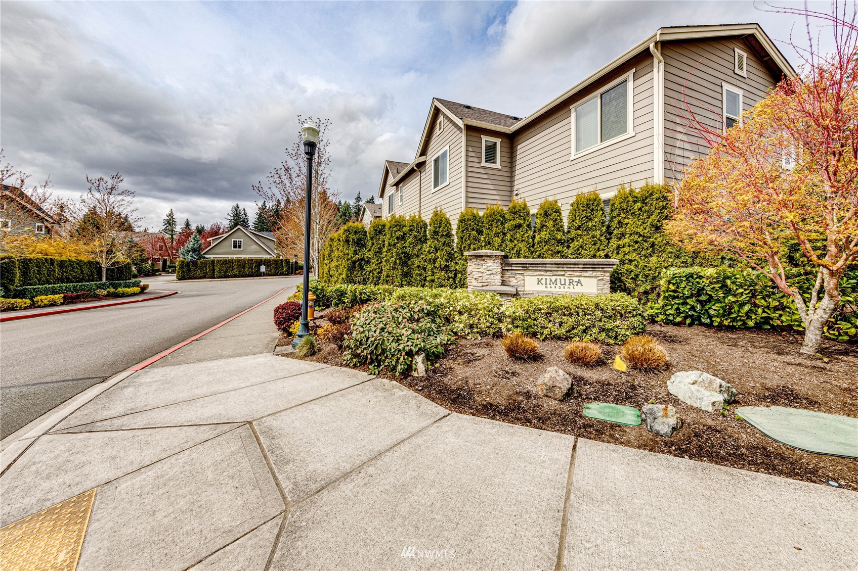 21821 38th Drive Southeast Bothell, WA 98021 - Photo 29 of 29 a front view of a house with a yard