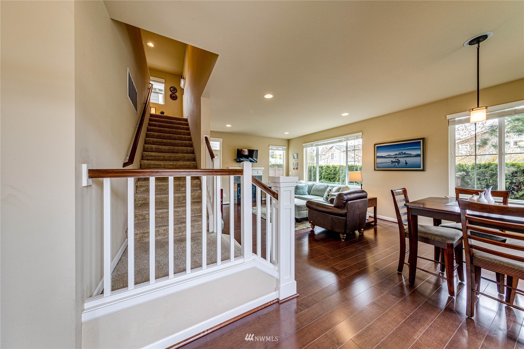 21821 38th Drive Southeast Bothell, WA 98021 - Photo 3 of 29 a livingroom with furniture wooden floor and windows