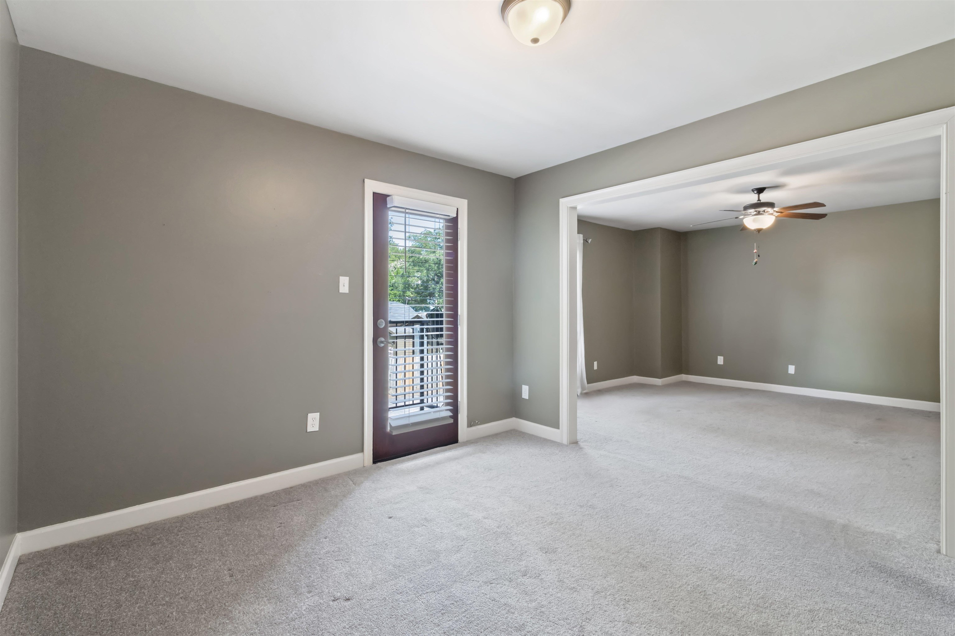 700 St Augustine Square, Unit D Memphis, TN 38104 - Photo 23 of 31 an empty room with windows and closet