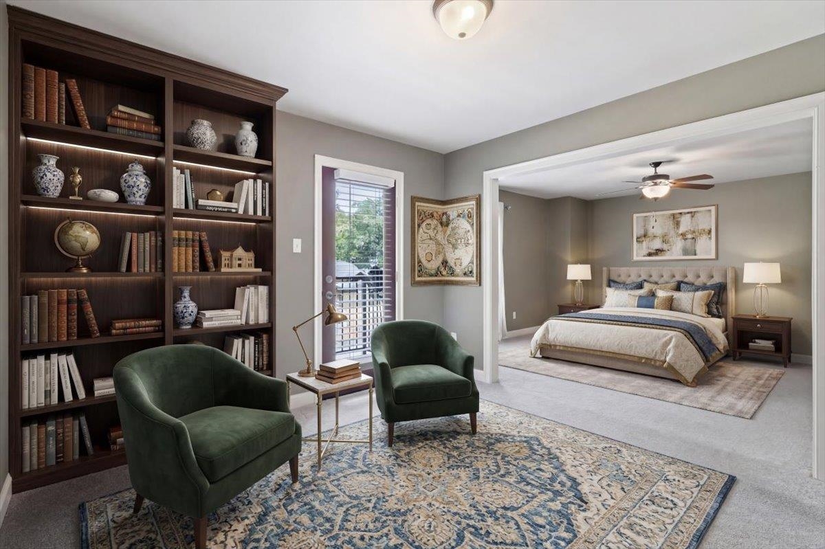 700 St Augustine Square, Unit D Memphis, TN 38104 - Photo 24 of 31 a bedroom with a bed a couch and a bookshelf