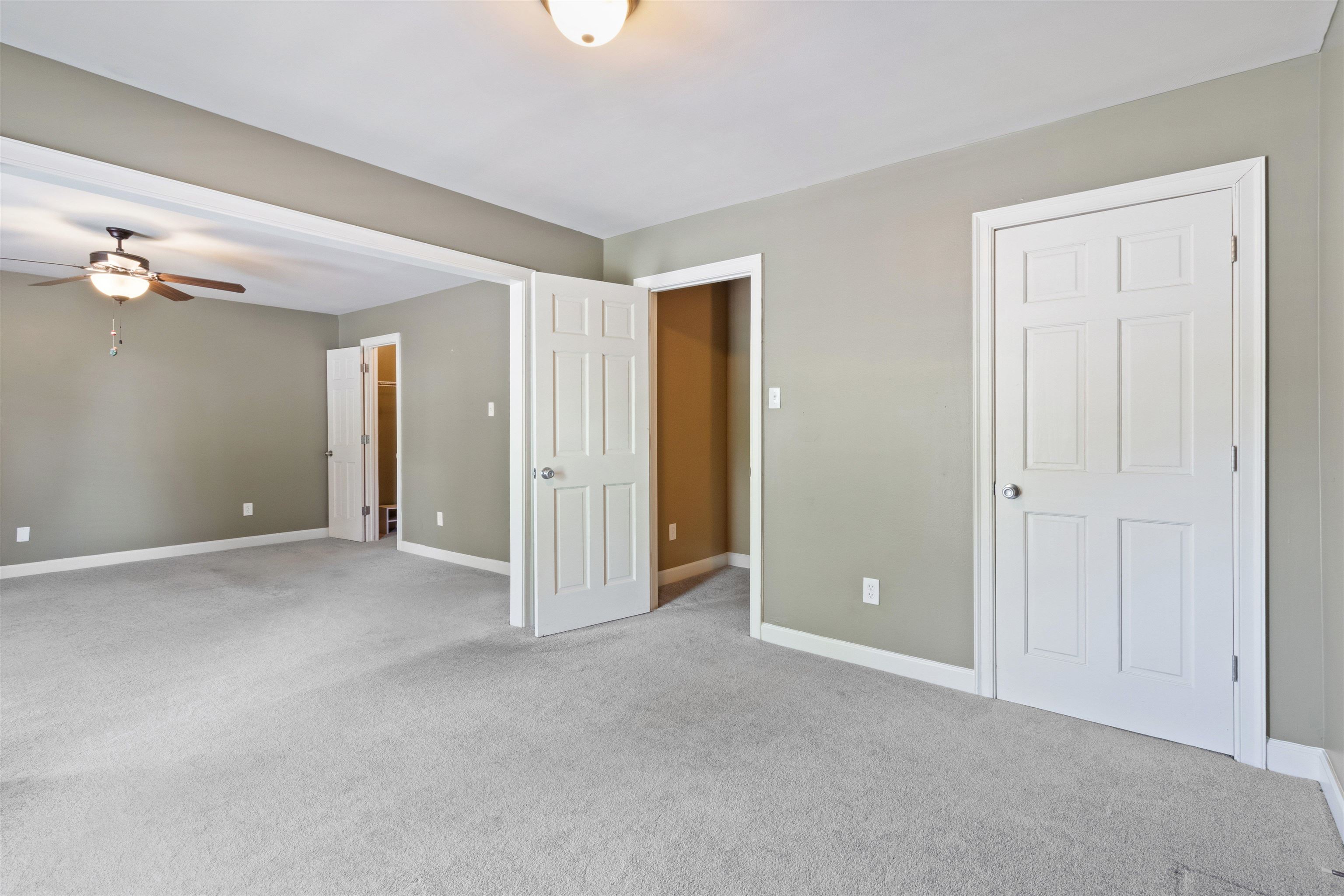 700 St Augustine Square, Unit D Memphis, TN 38104 - Photo 26 of 31 a view of an empty room with a ceiling fan