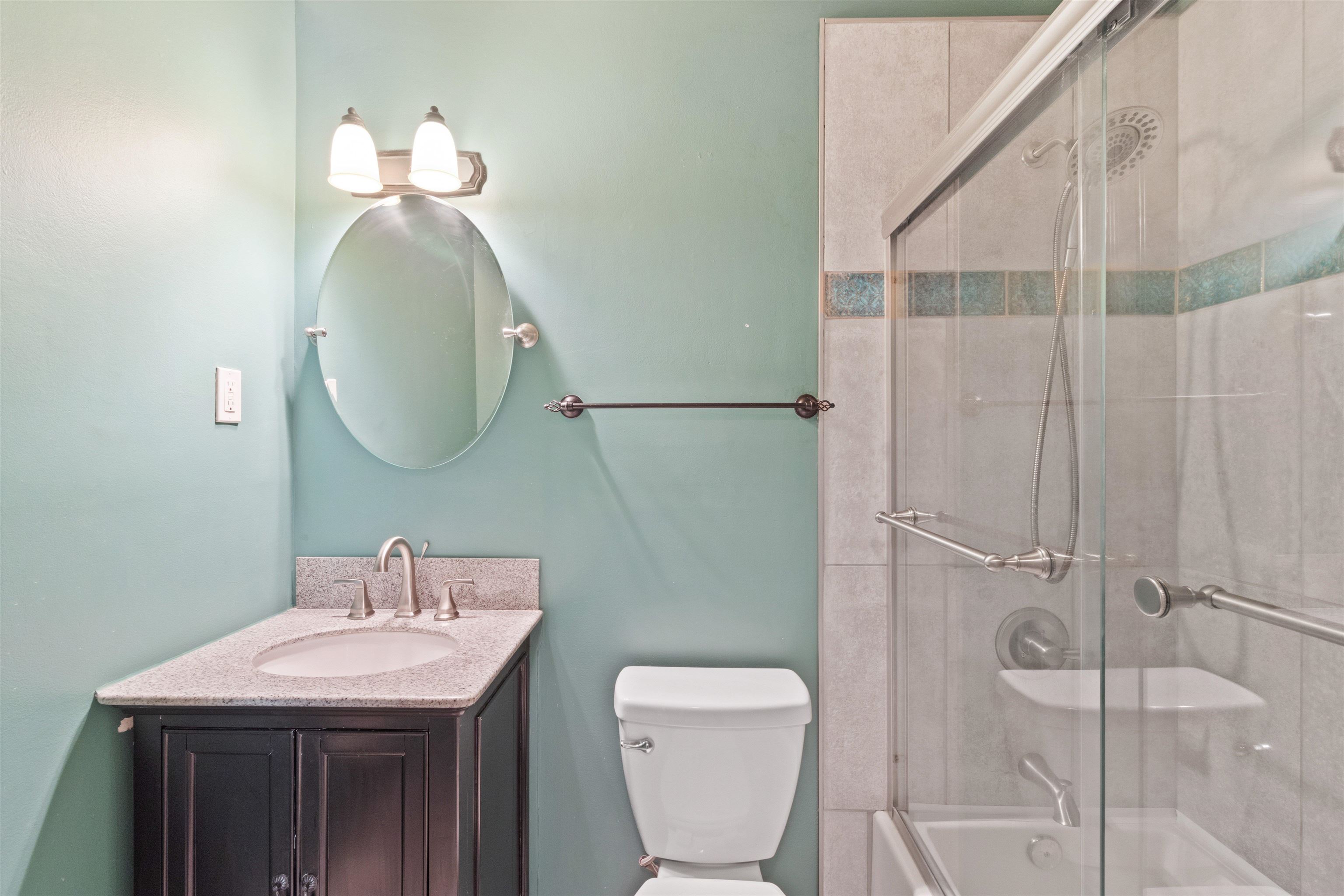700 St Augustine Square, Unit D Memphis, TN 38104 - Photo 27 of 31 a bathroom with a sink a toilet and shower