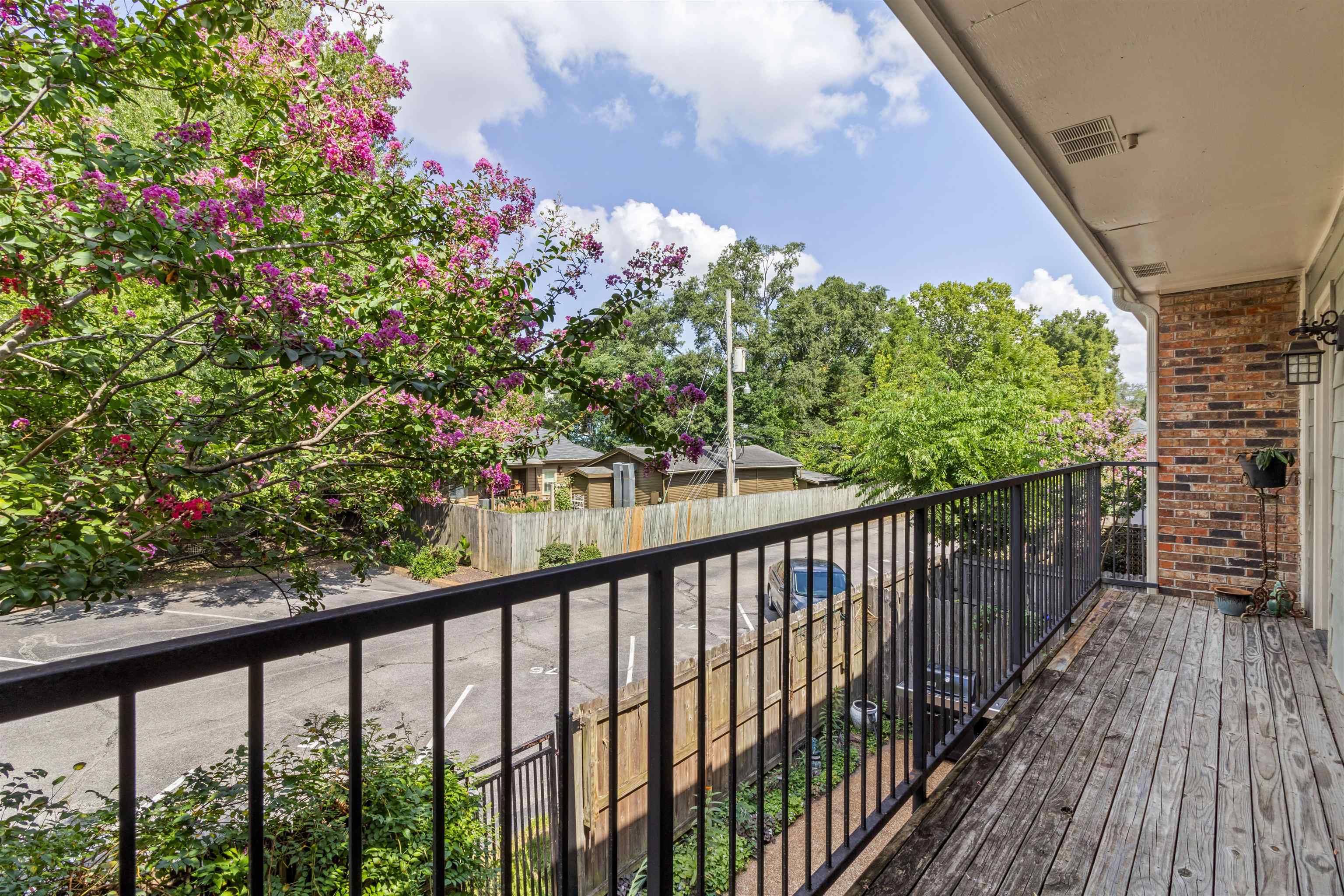 700 St Augustine Square, Unit D Memphis, TN 38104 - Photo 29 of 31 a view of a balcony with a pot