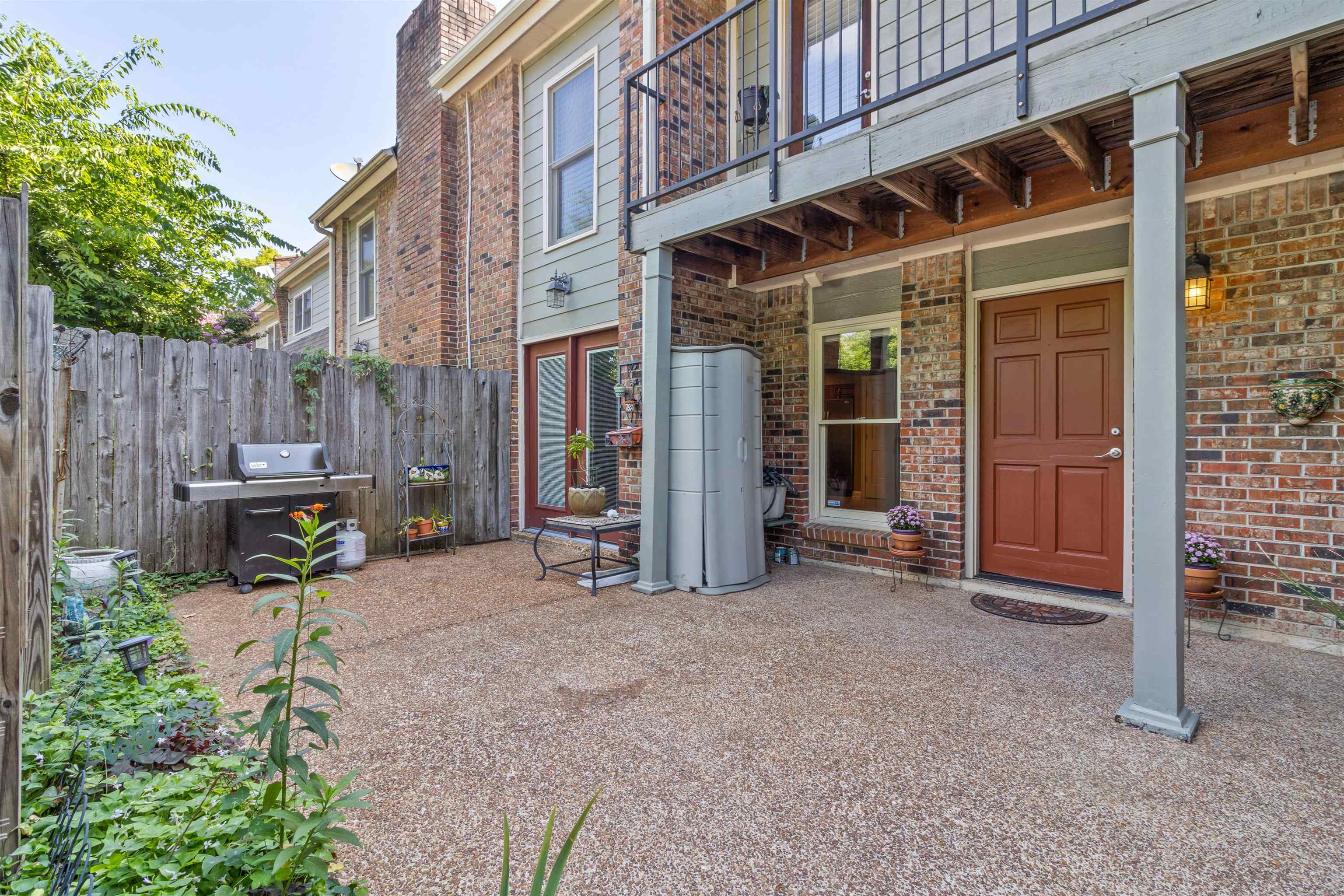 700 St Augustine Square, Unit D Memphis, TN 38104 - Photo 4 of 31 a view of a house with backyard porch and sitting area