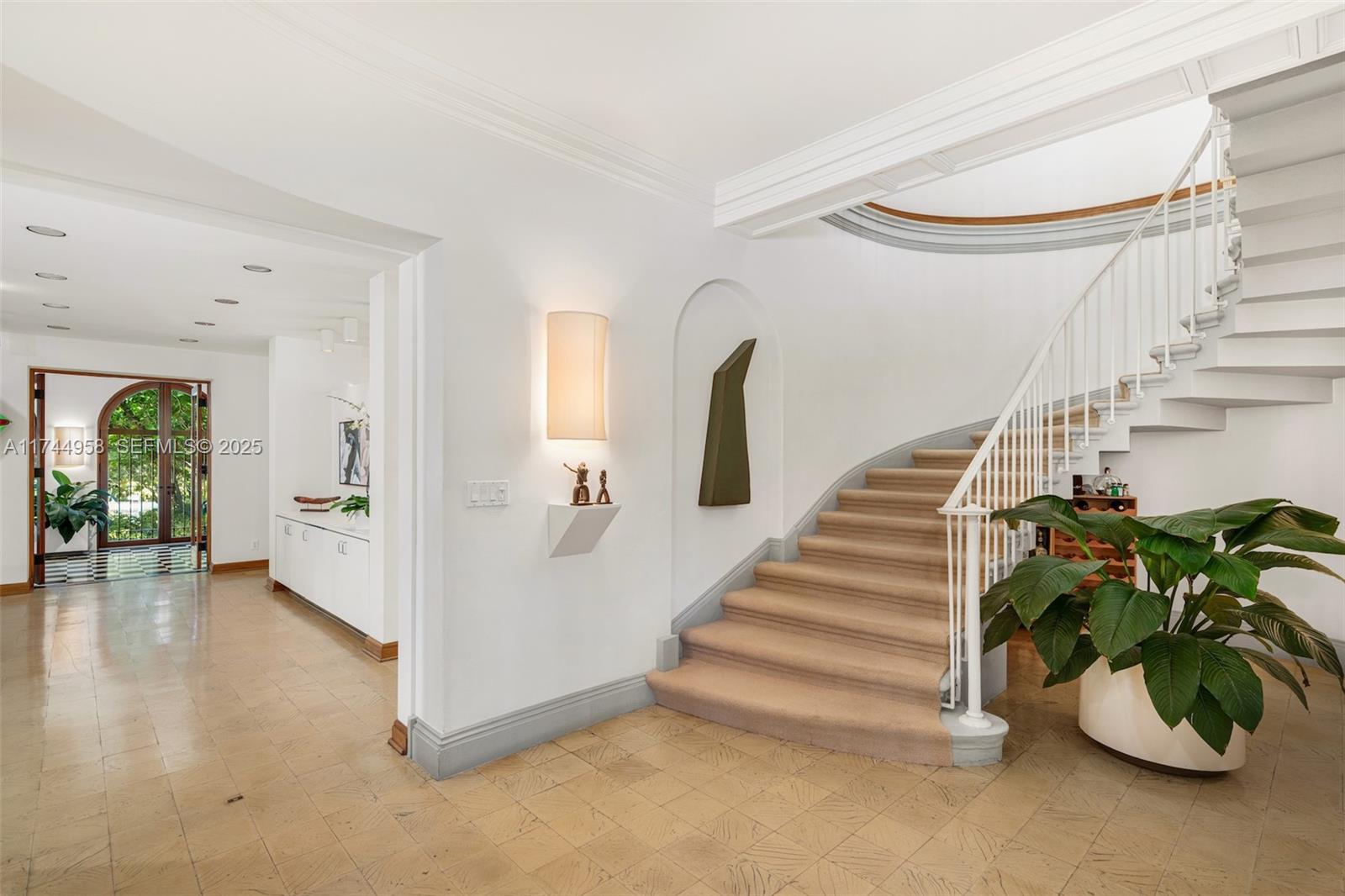 4197 Douglas Road Miami, FL 33133 - Photo 7 of 42 a view of entryway and hall