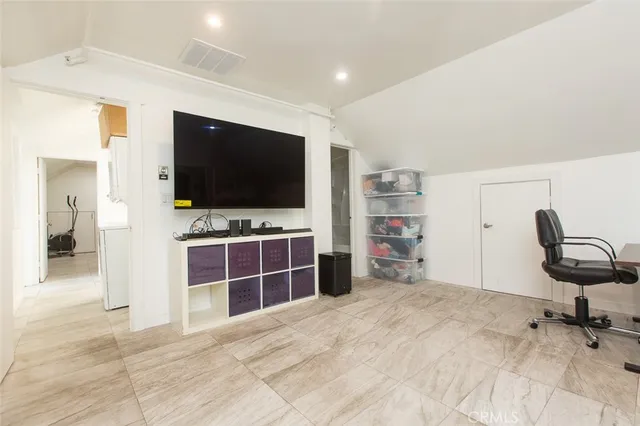 a view of a workspace with furniture