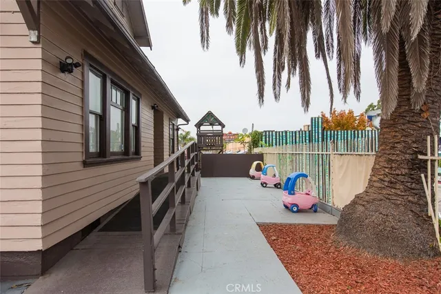 a view of a house with a street