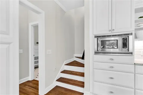 a utility room with sink dryer and washer