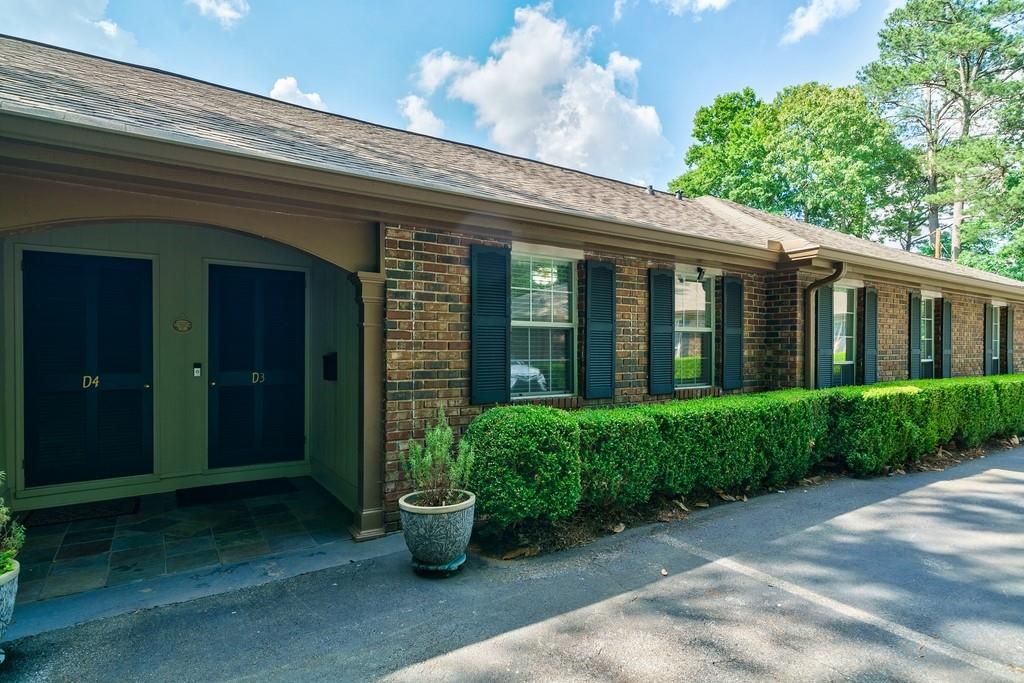 5375 Roswell Road, Unit D3 Atlanta, GA 30342 - Photo 1 of 1 a view of a house with porch and garden