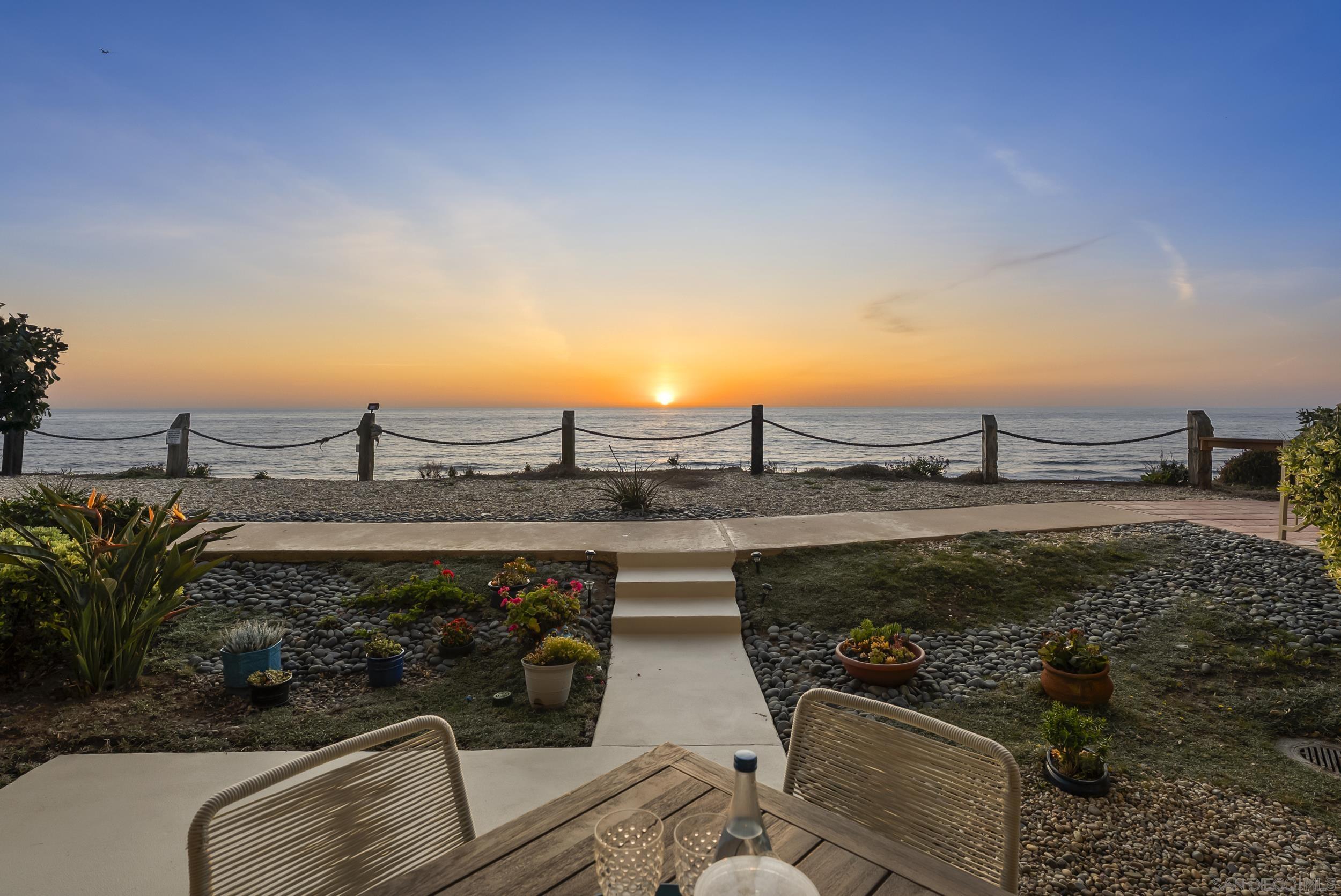 441 South Sierra Avenue, Unit 109 Solana Beach, CA 92075 - Photo 1 of 39 a view of a terrace with a bench