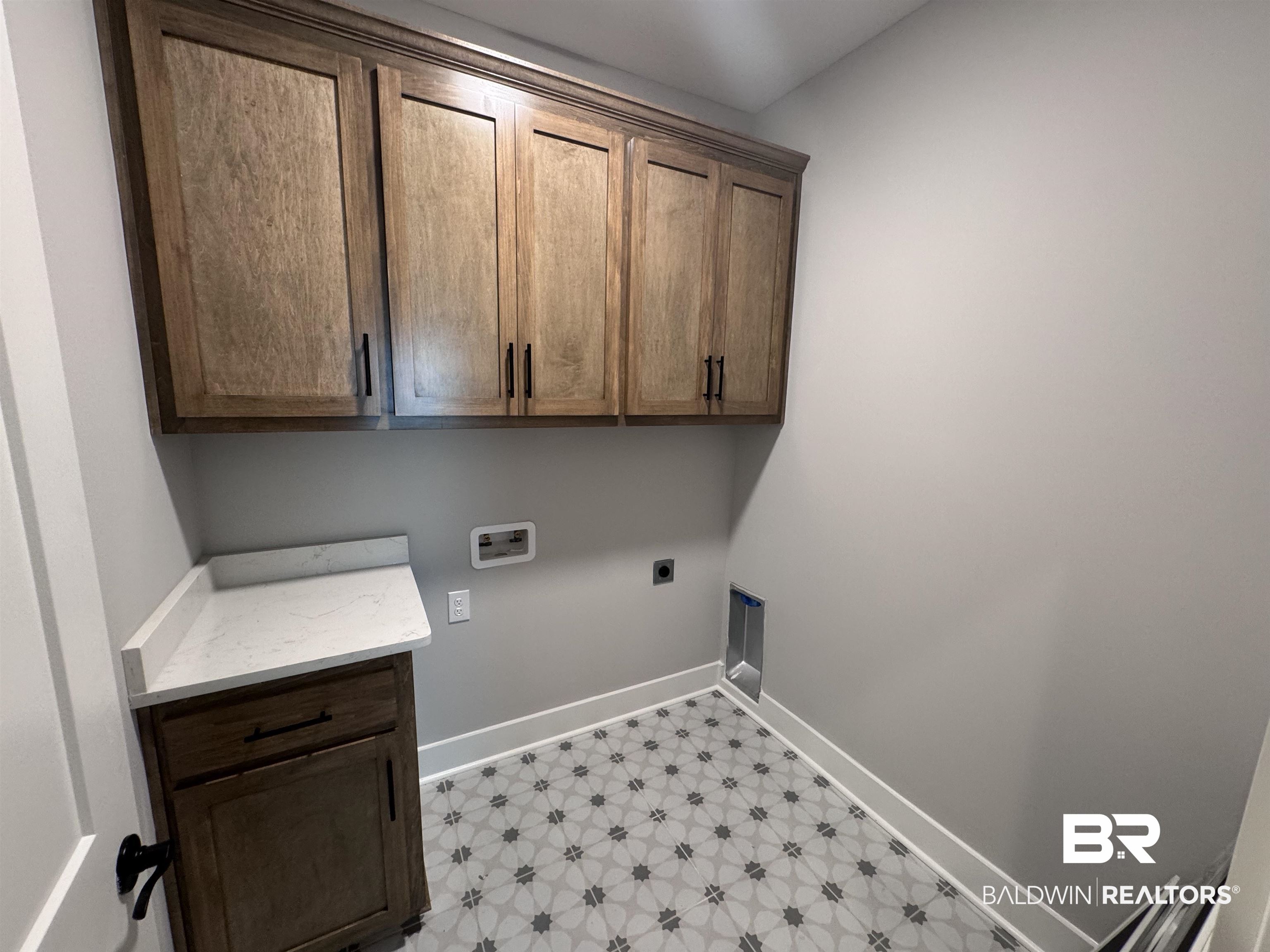 27371 Patch Pl Loop Daphne, AL 36526 - Photo 43 of 63 Laundry room with light floors, washer hookup, cabinet space, and electric dryer hookup