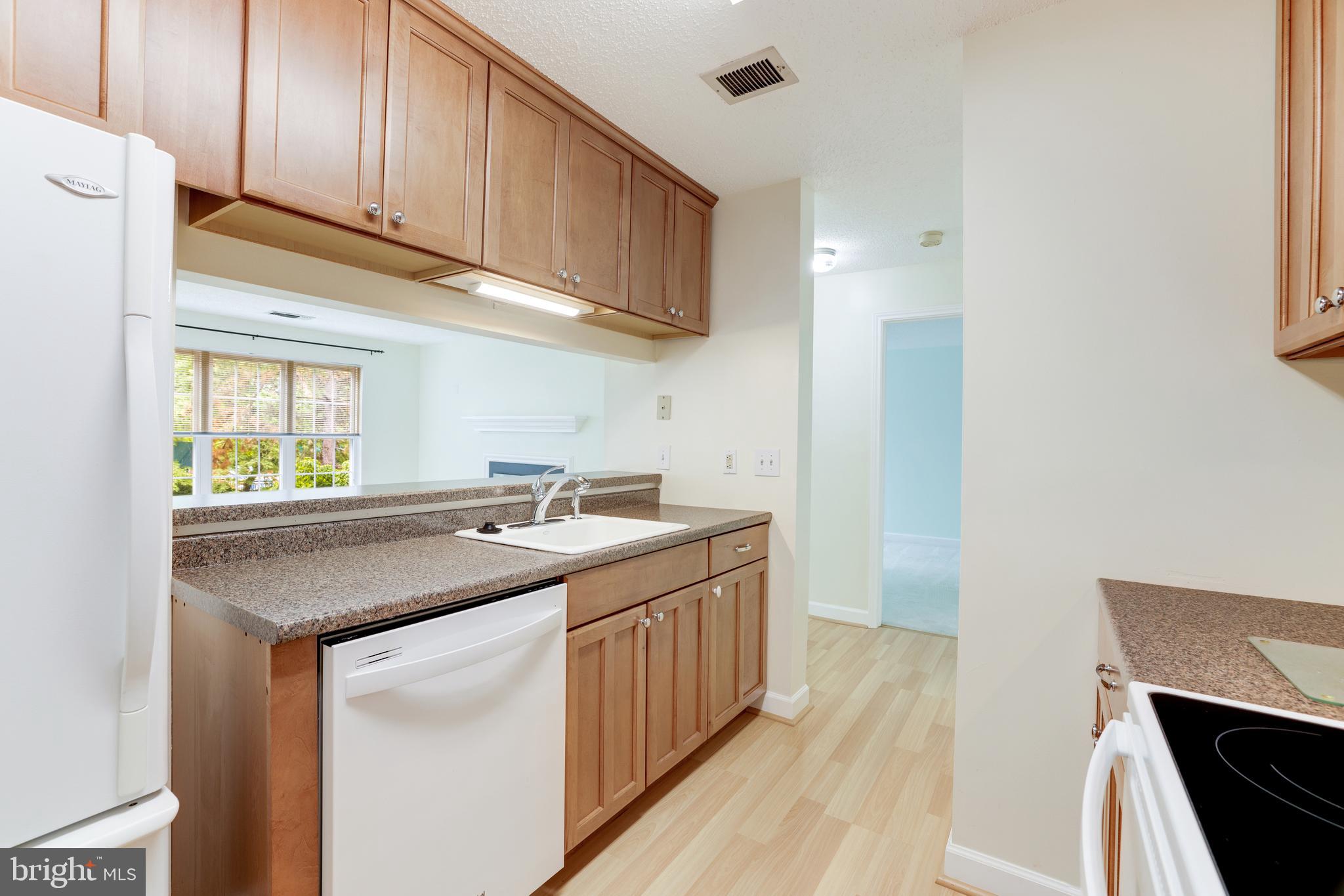 20977 Timber Ridge Terrace, Unit 204 Ashburn, VA 20147 - Photo 12 of 27 Kitchen