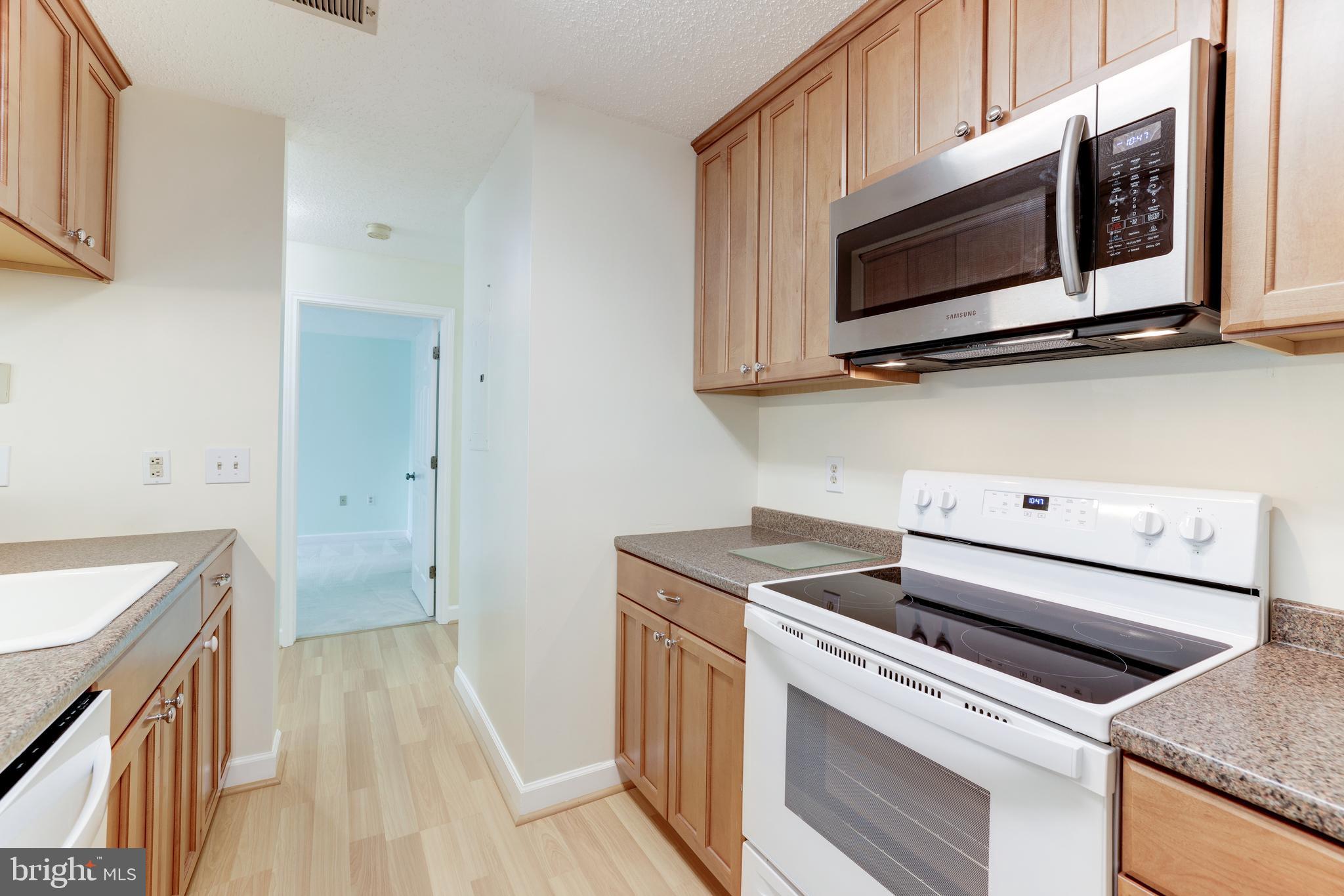 20977 Timber Ridge Terrace, Unit 204 Ashburn, VA 20147 - Photo 13 of 27 Kitchen