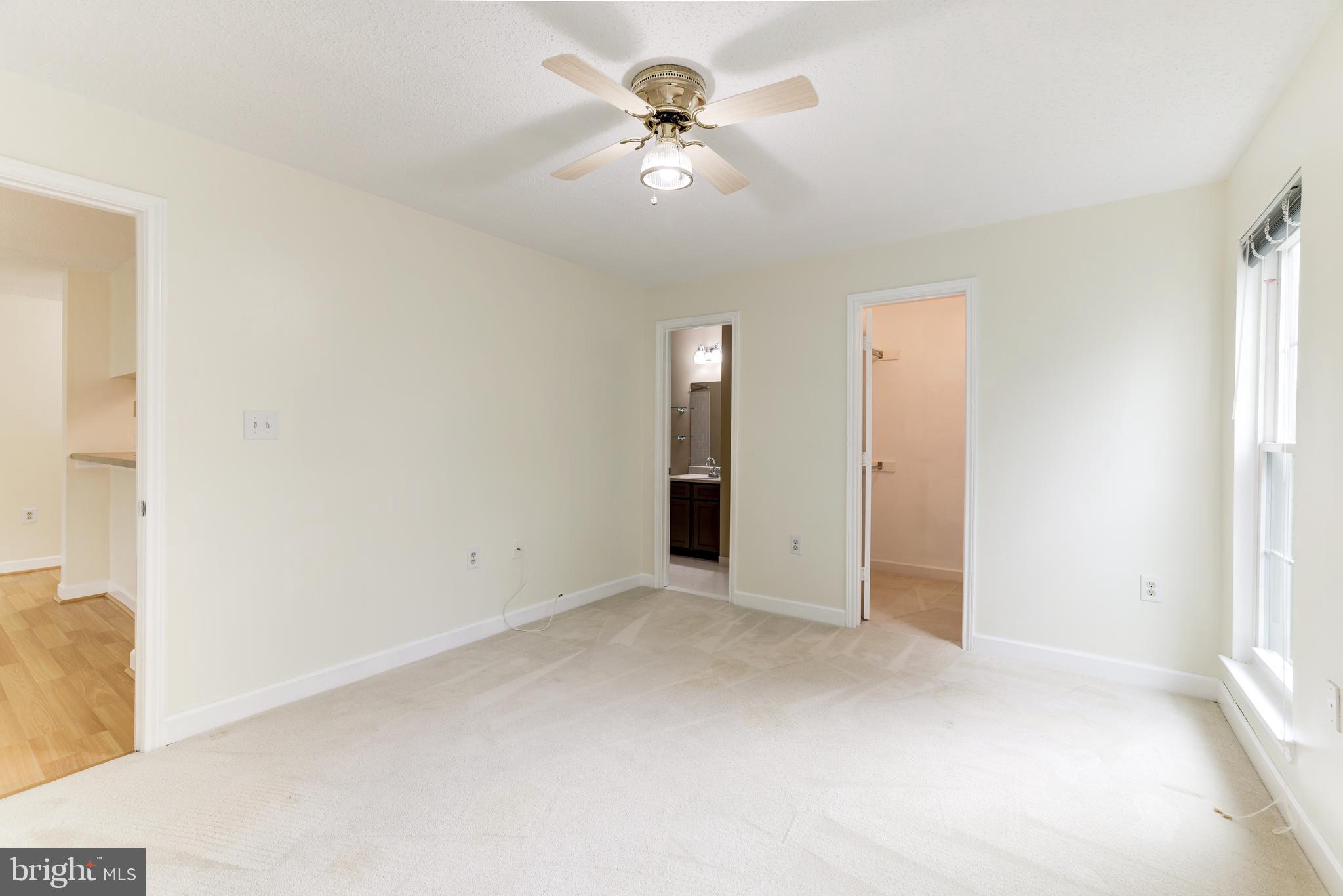 20977 Timber Ridge Terrace, Unit 204 Ashburn, VA 20147 - Photo 14 of 27 Primary Bedroom