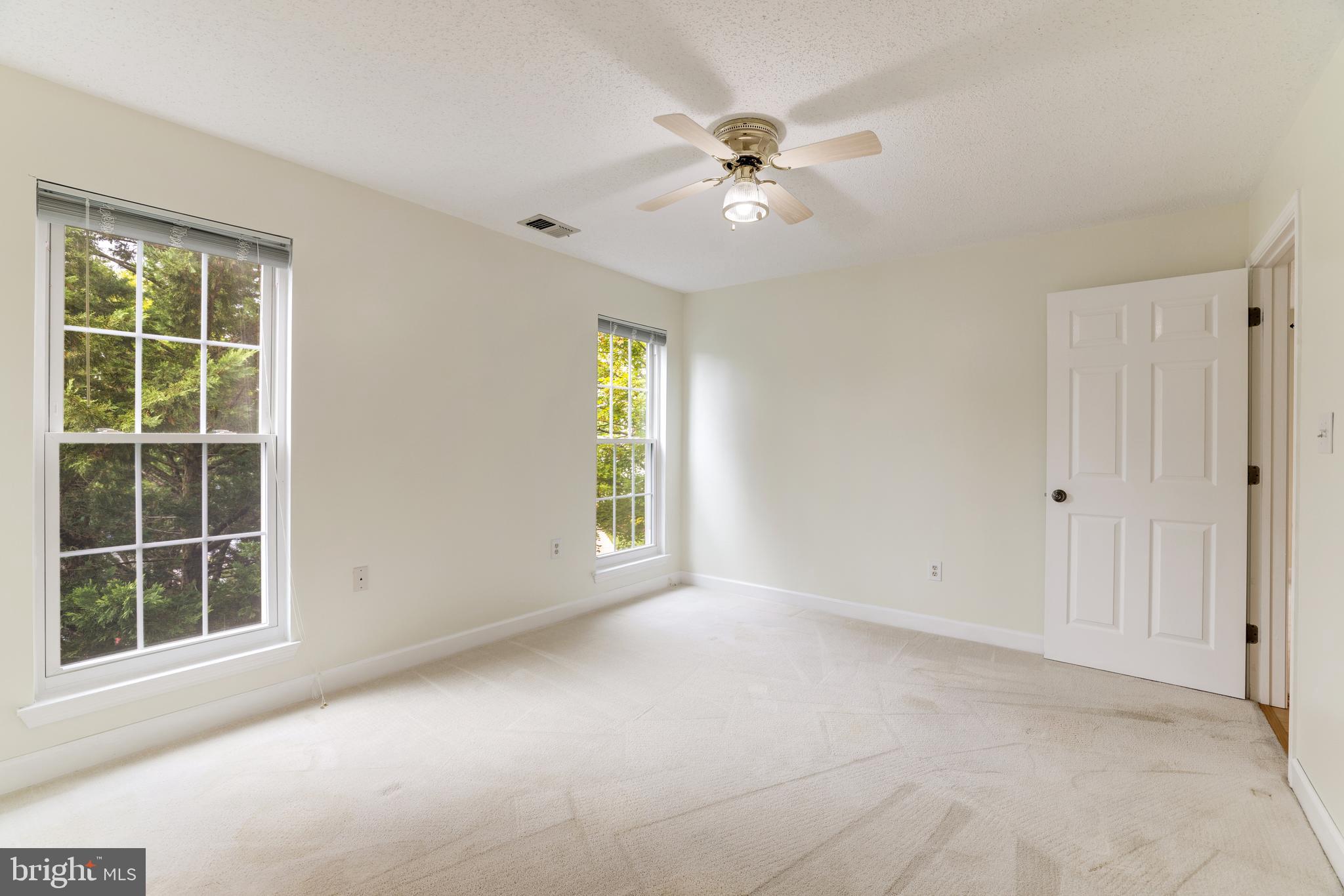 20977 Timber Ridge Terrace, Unit 204 Ashburn, VA 20147 - Photo 15 of 27 Primary Bedroom