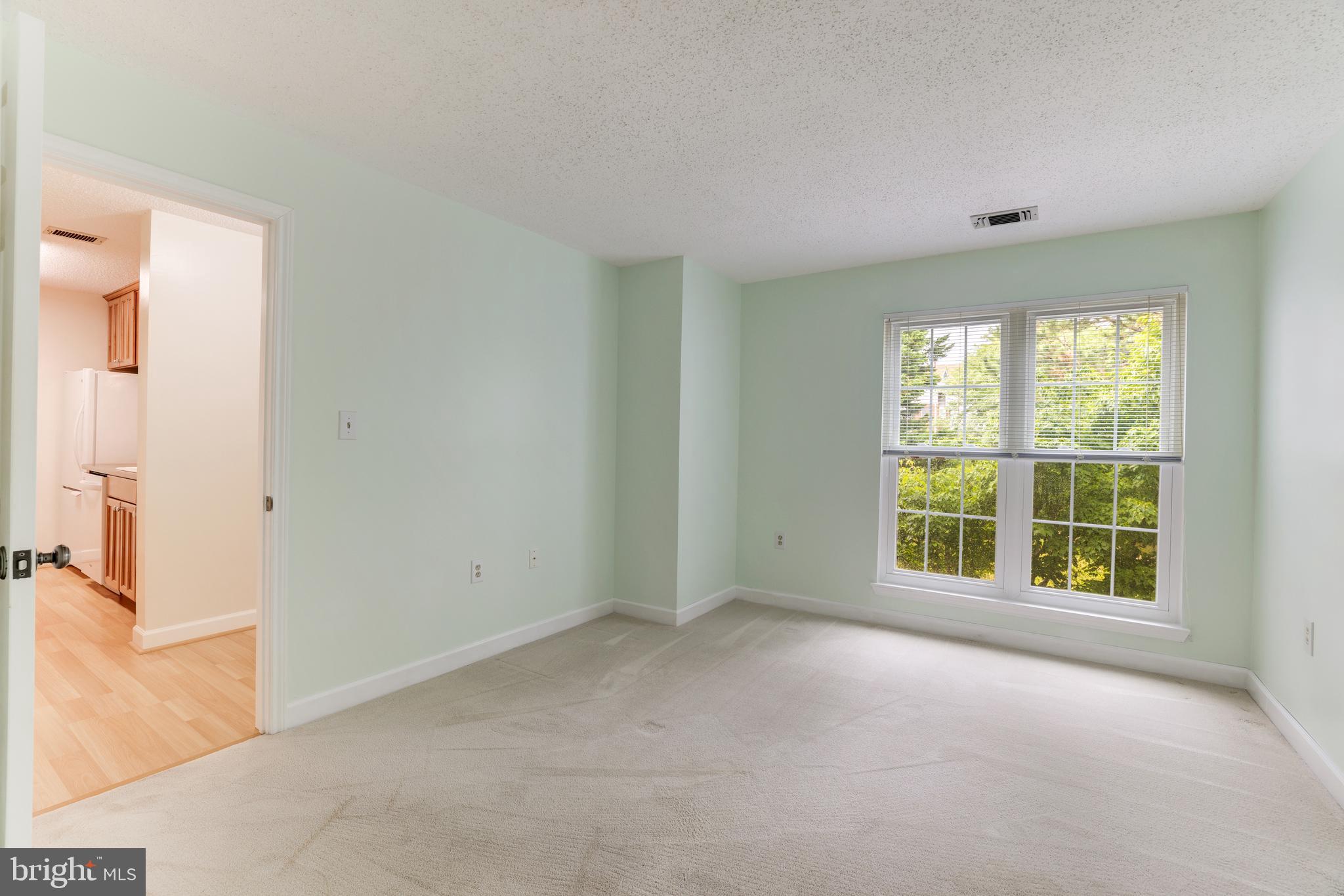 20977 Timber Ridge Terrace, Unit 204 Ashburn, VA 20147 - Photo 18 of 27 Spacious Second Bedroom
