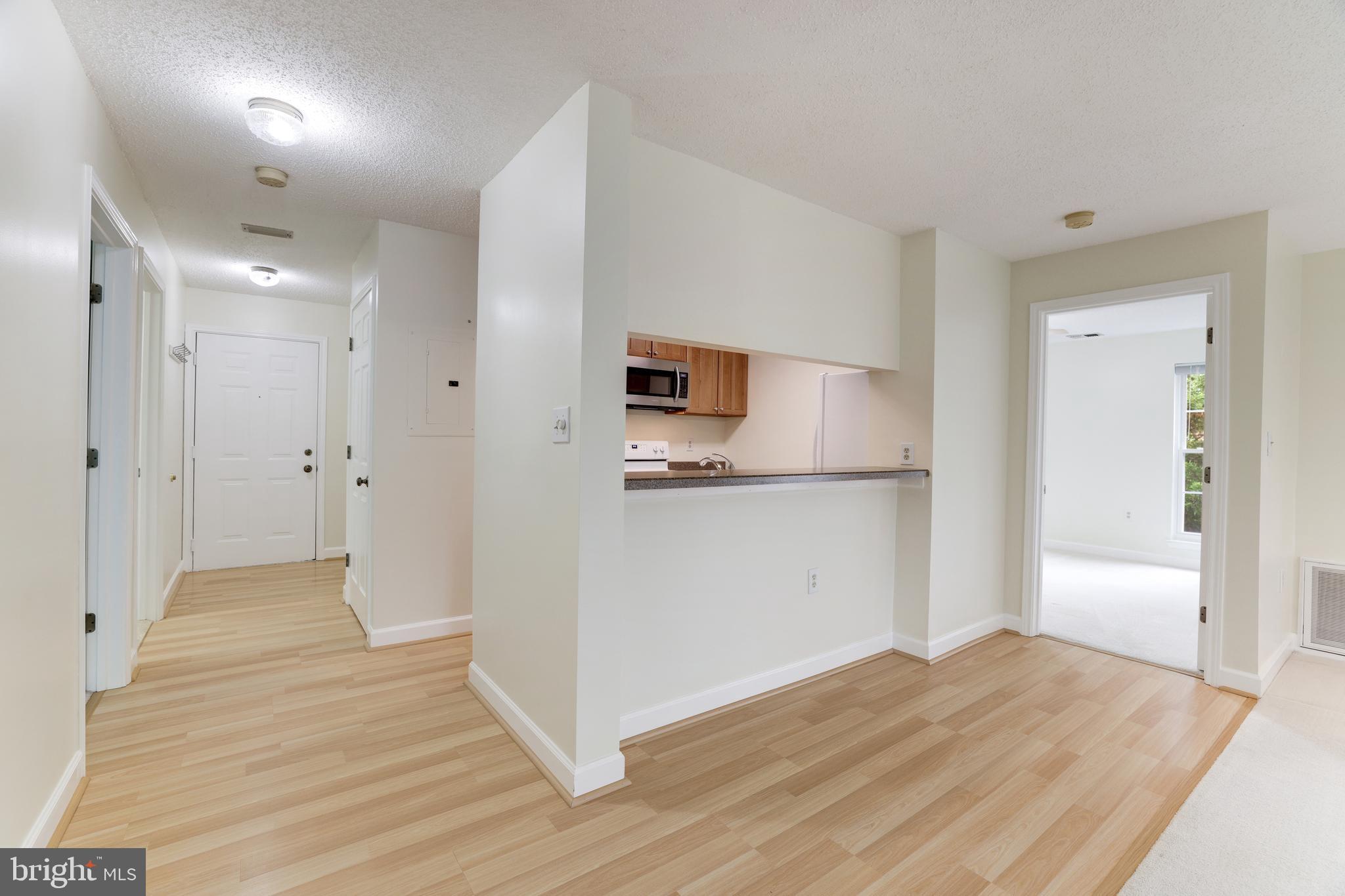 20977 Timber Ridge Terrace, Unit 204 Ashburn, VA 20147 - Photo 7 of 27 Kitchen