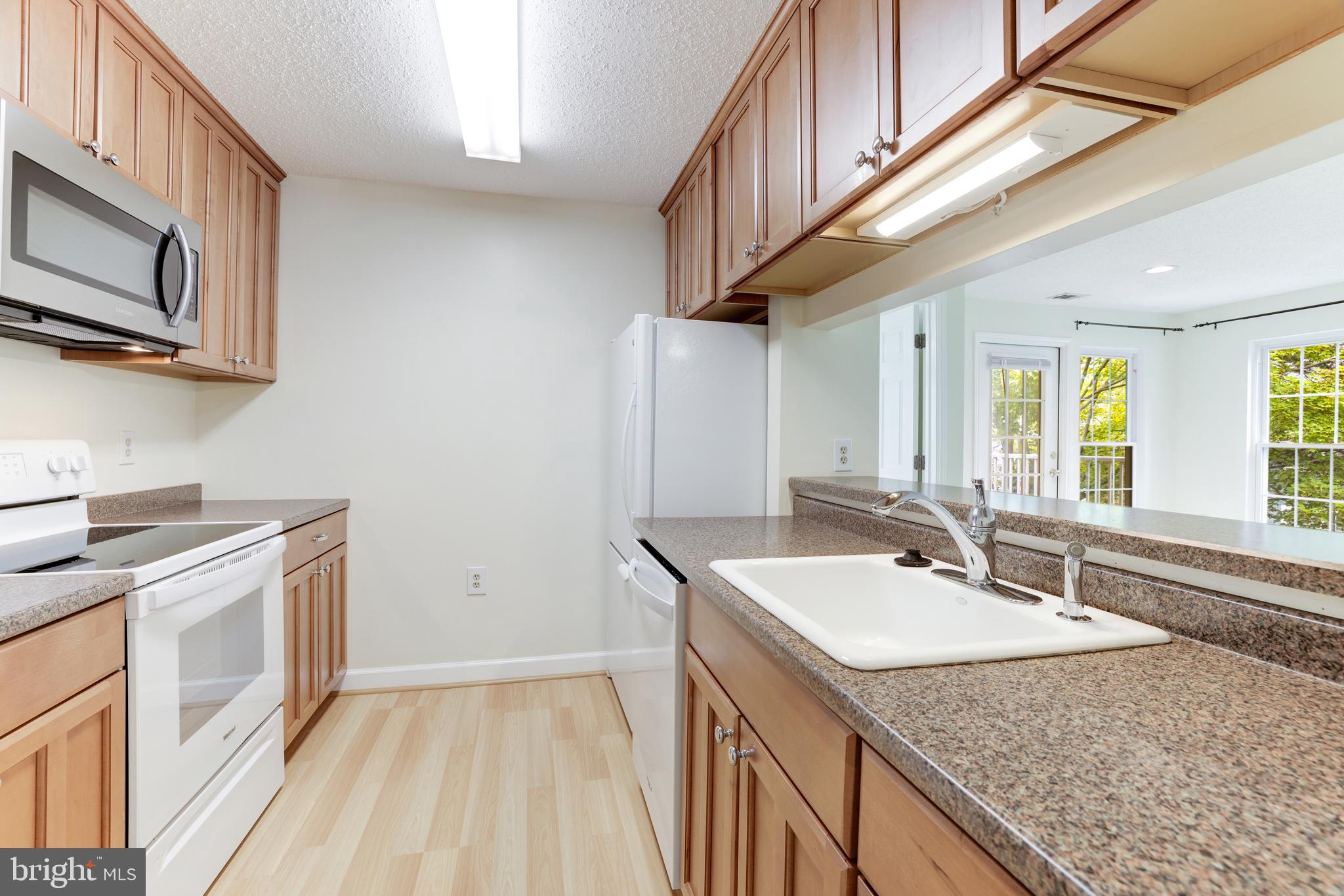 20977 Timber Ridge Terrace, Unit 204 Ashburn, VA 20147 - Photo 8 of 27 Kitchen
