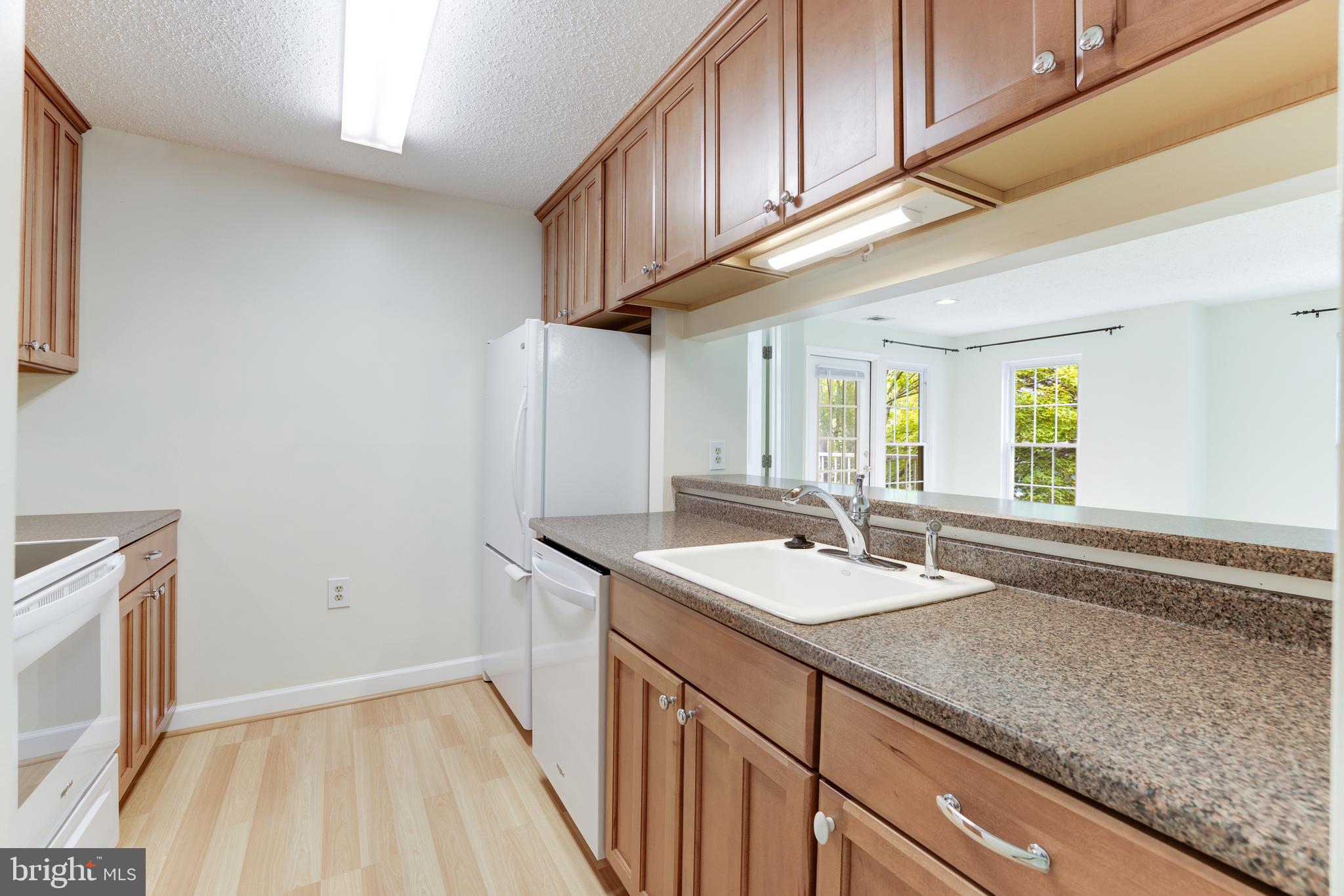 20977 Timber Ridge Terrace, Unit 204 Ashburn, VA 20147 - Photo 9 of 27 Kitchen