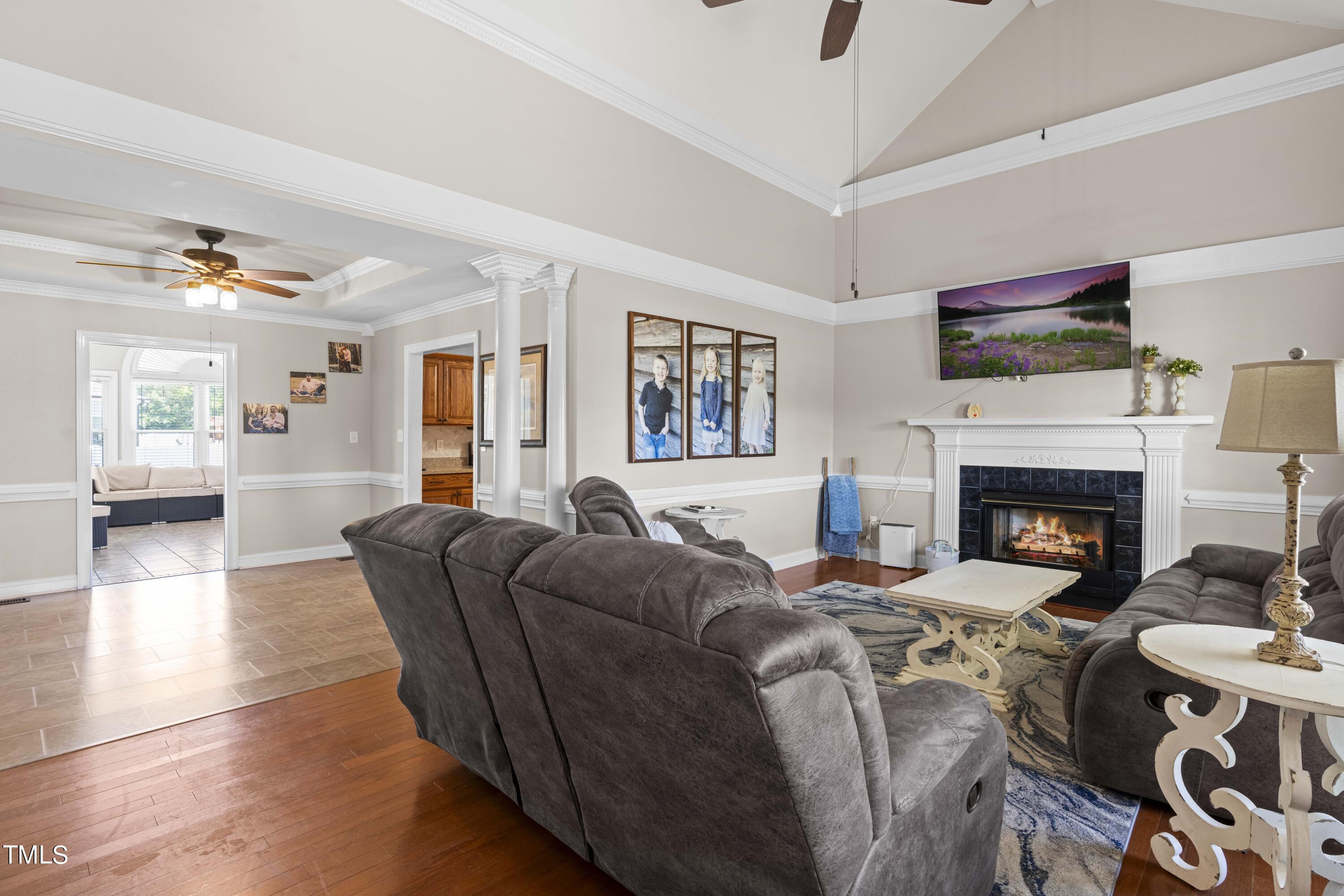 44 Oak Hill Drive Dunn, NC 28334 - Photo 9 of 40 a living room with furniture and a fireplace