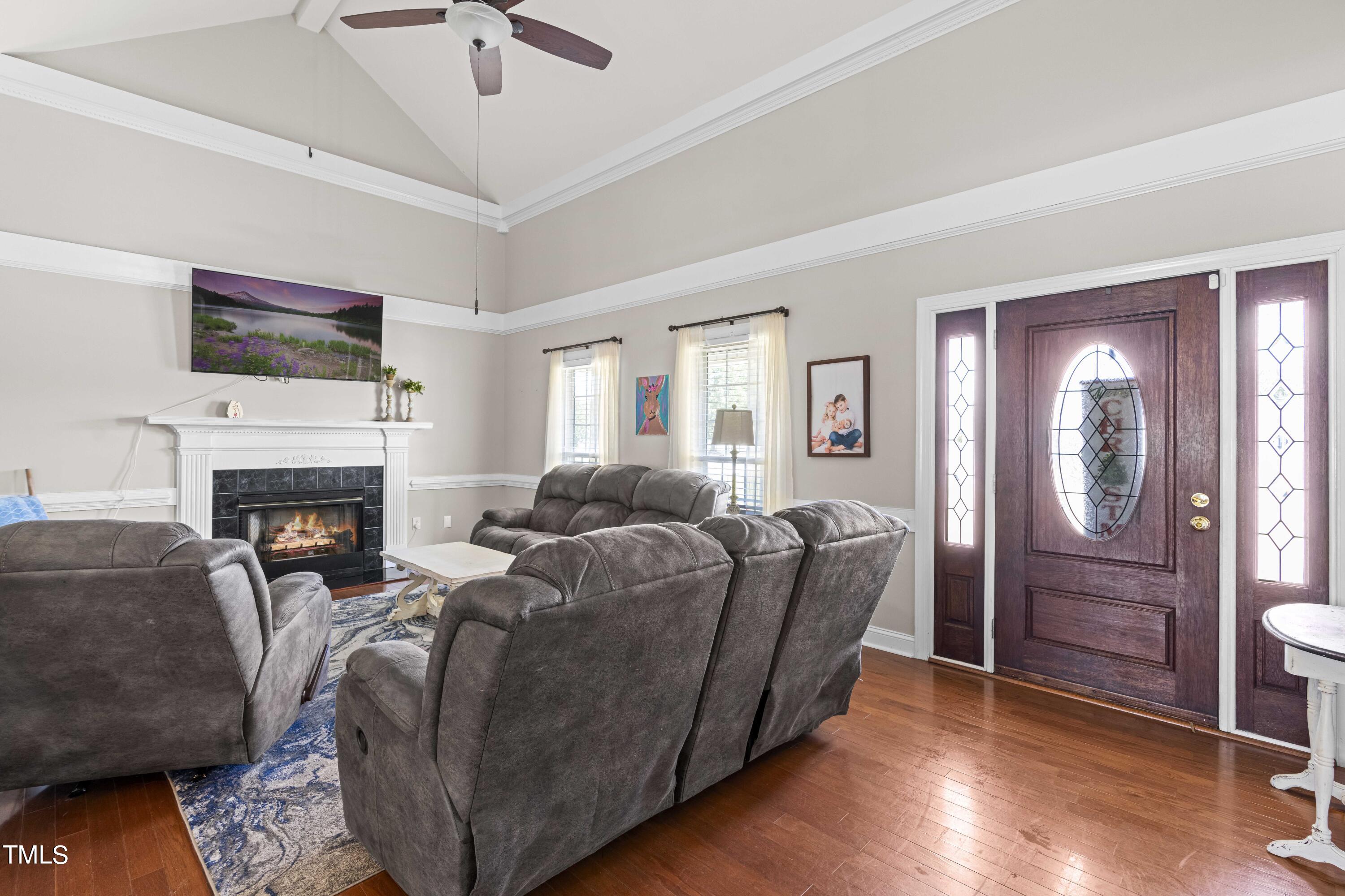 44 Oak Hill Drive Dunn, NC 28334 - Photo 10 of 40 a living room with furniture and a fireplace